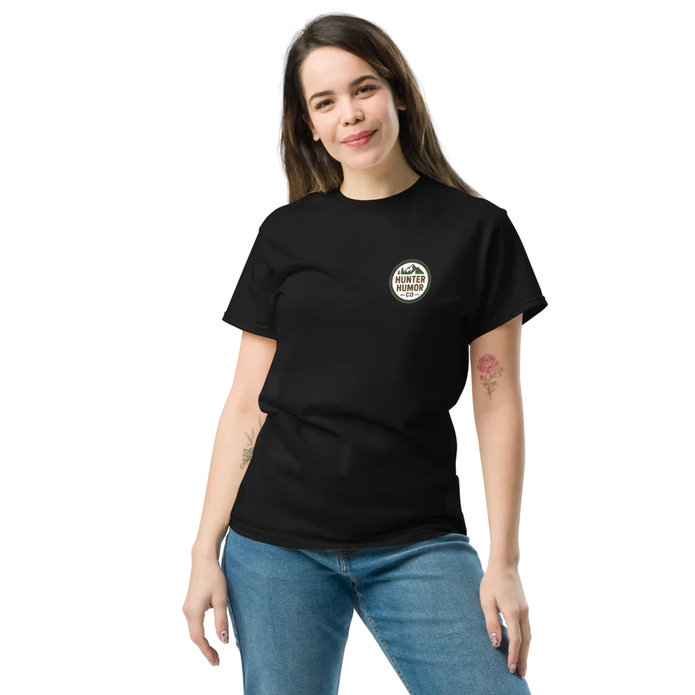 Woman wearing black unisex classic tee with Hunter Humor Co. logo, blue jeans