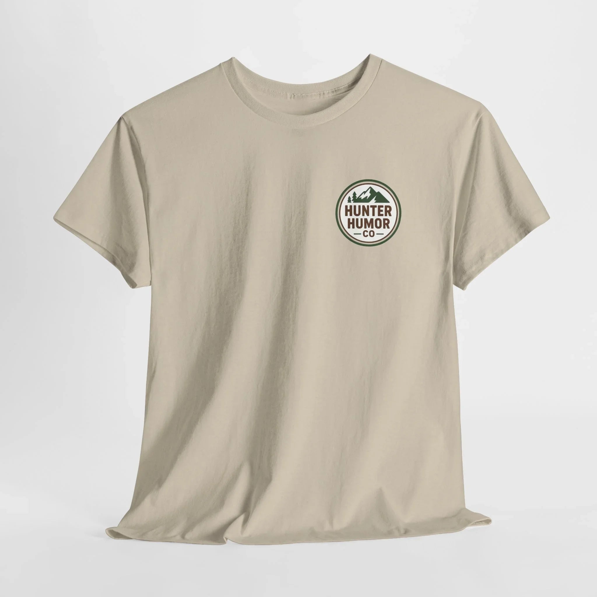 Beige Hunter Humor Co t-shirt with green logo and mountain graphic on front