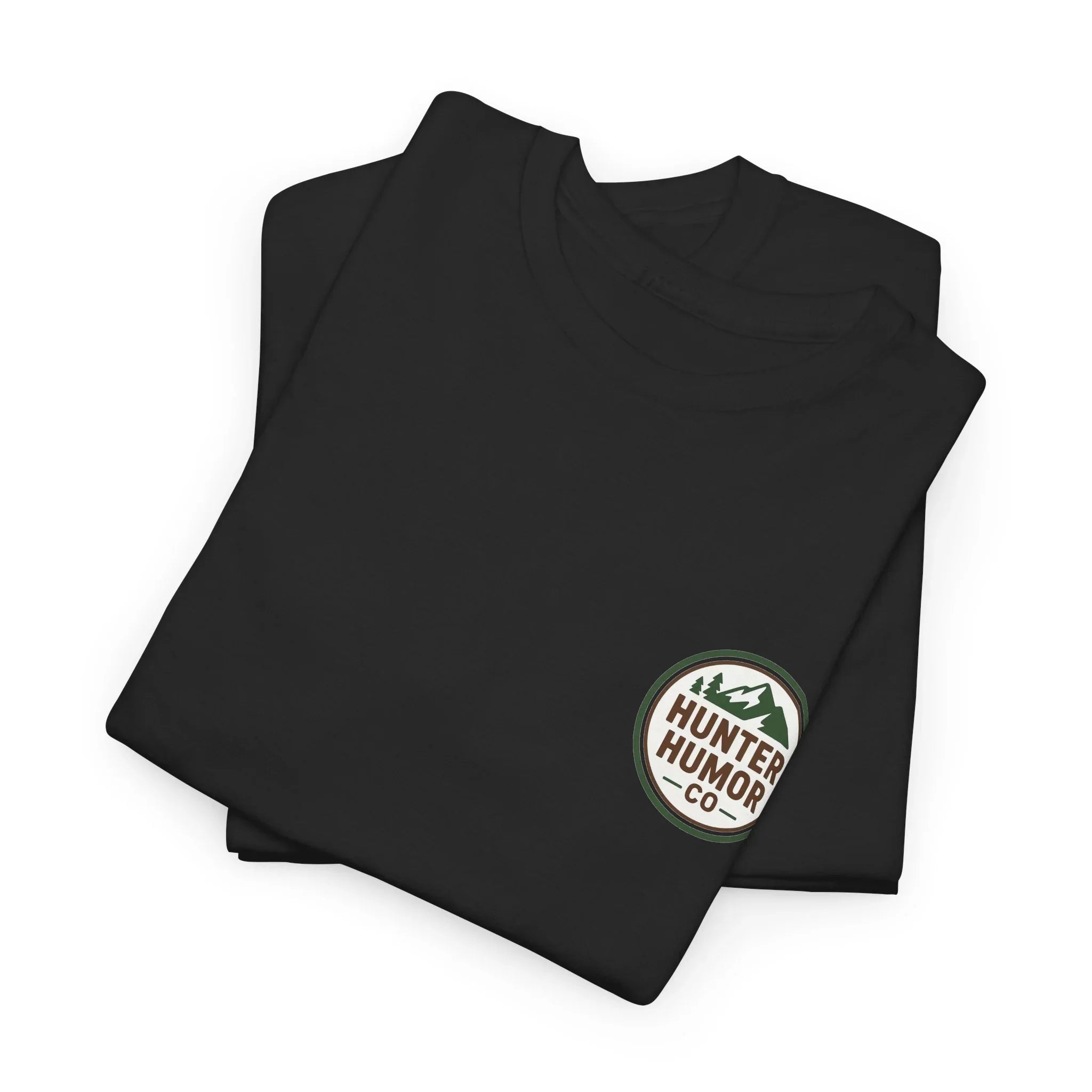 Folded black t-shirt with Hunter Humor Co. mountain logo on chest, outdoor apparel