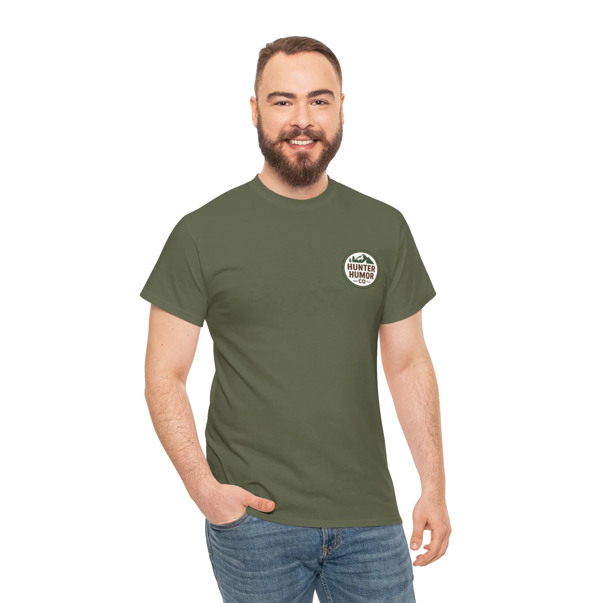 Smiling man in olive green Hunter Humor Co. t-shirt and jeans on white background