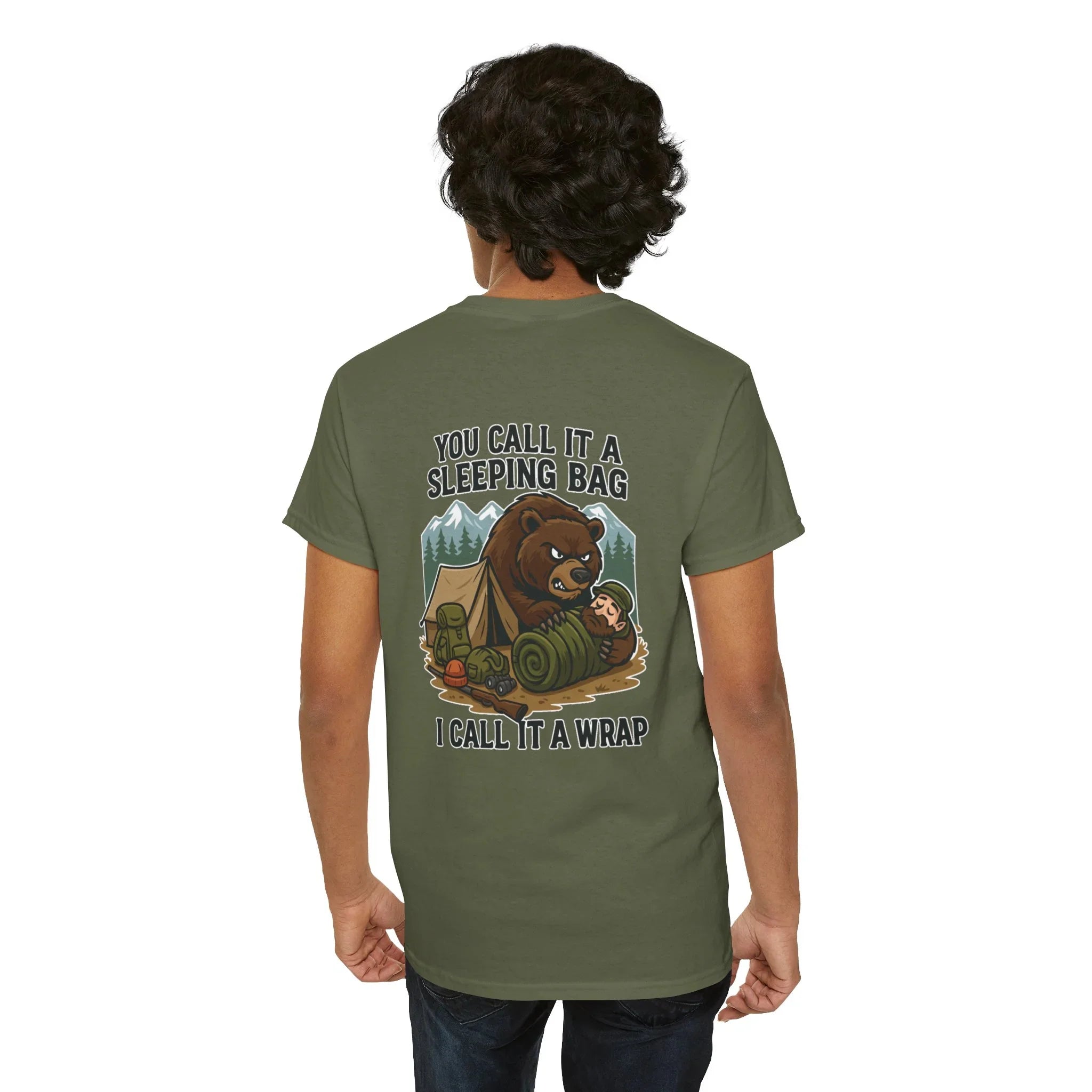 Man wearing green camping t-shirt with bear cartoon, tent, and funny sleeping bag quote