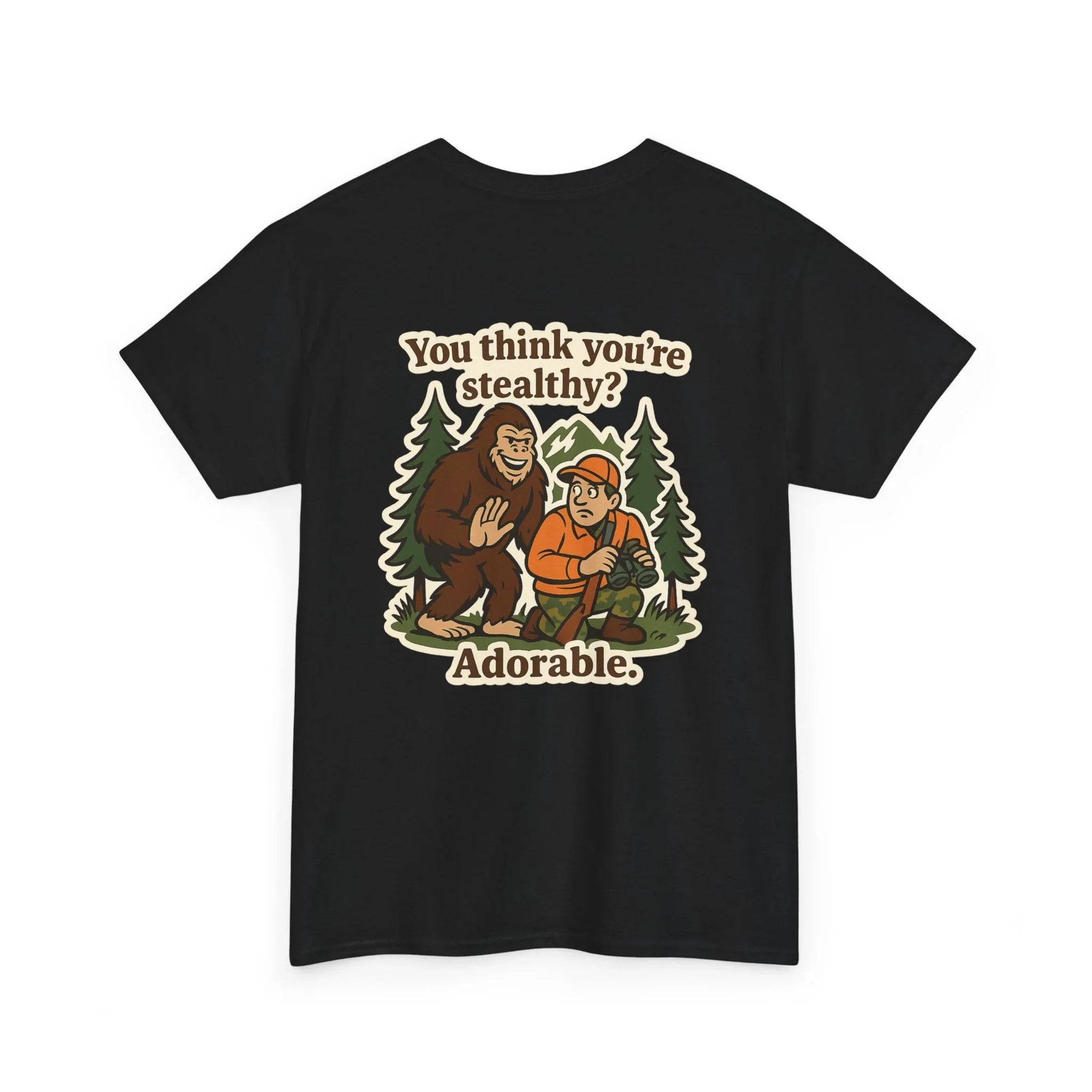 Black t-shirt with cartoon Bigfoot, hunter, pine trees, and text You think you're stealthy? Adorable.