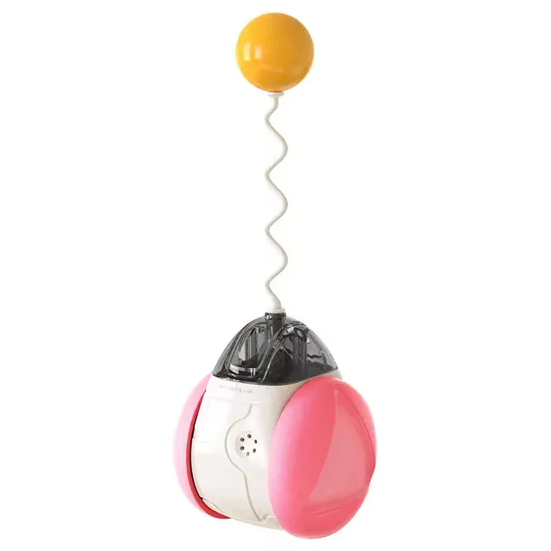 Interactive cat toy ball with pink sides, white body, and yellow bouncing ball