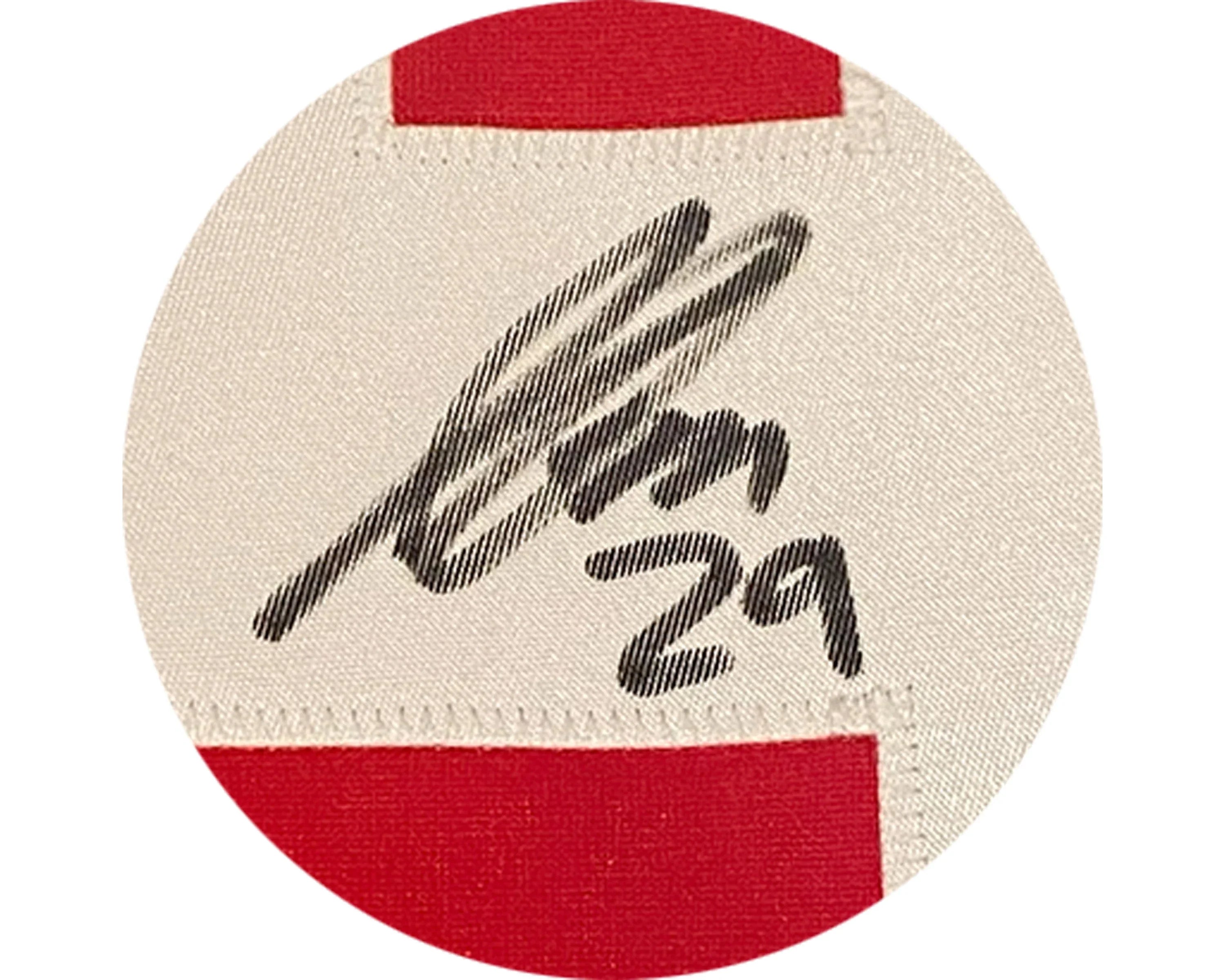 Black signature and number 29 on red and white Canada flag hockey jersey patch