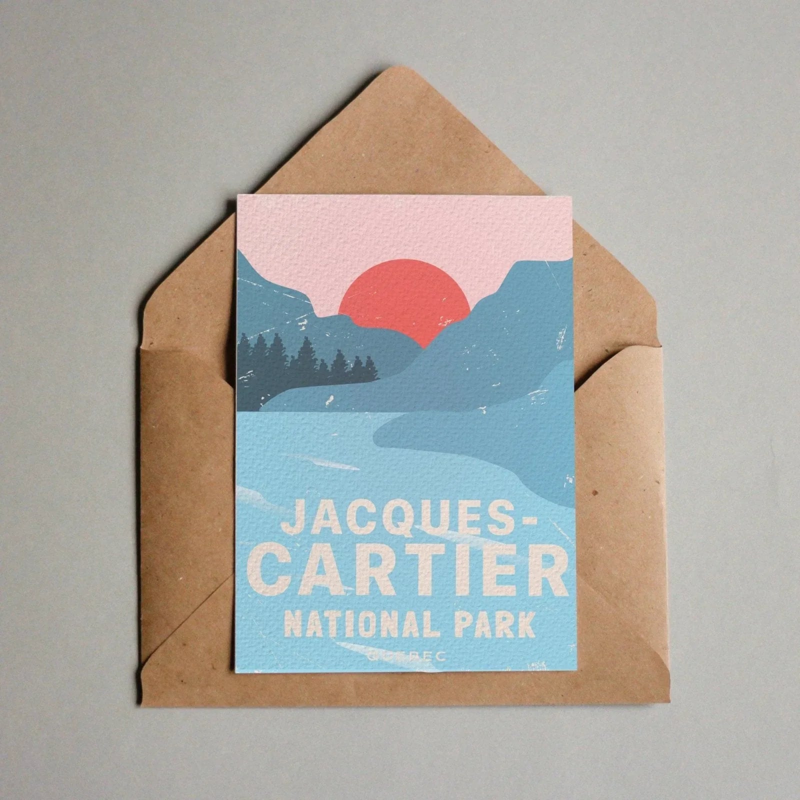 Jacques-Cartier National Park postcard with stylized blue mountains, pink sky, and red sun