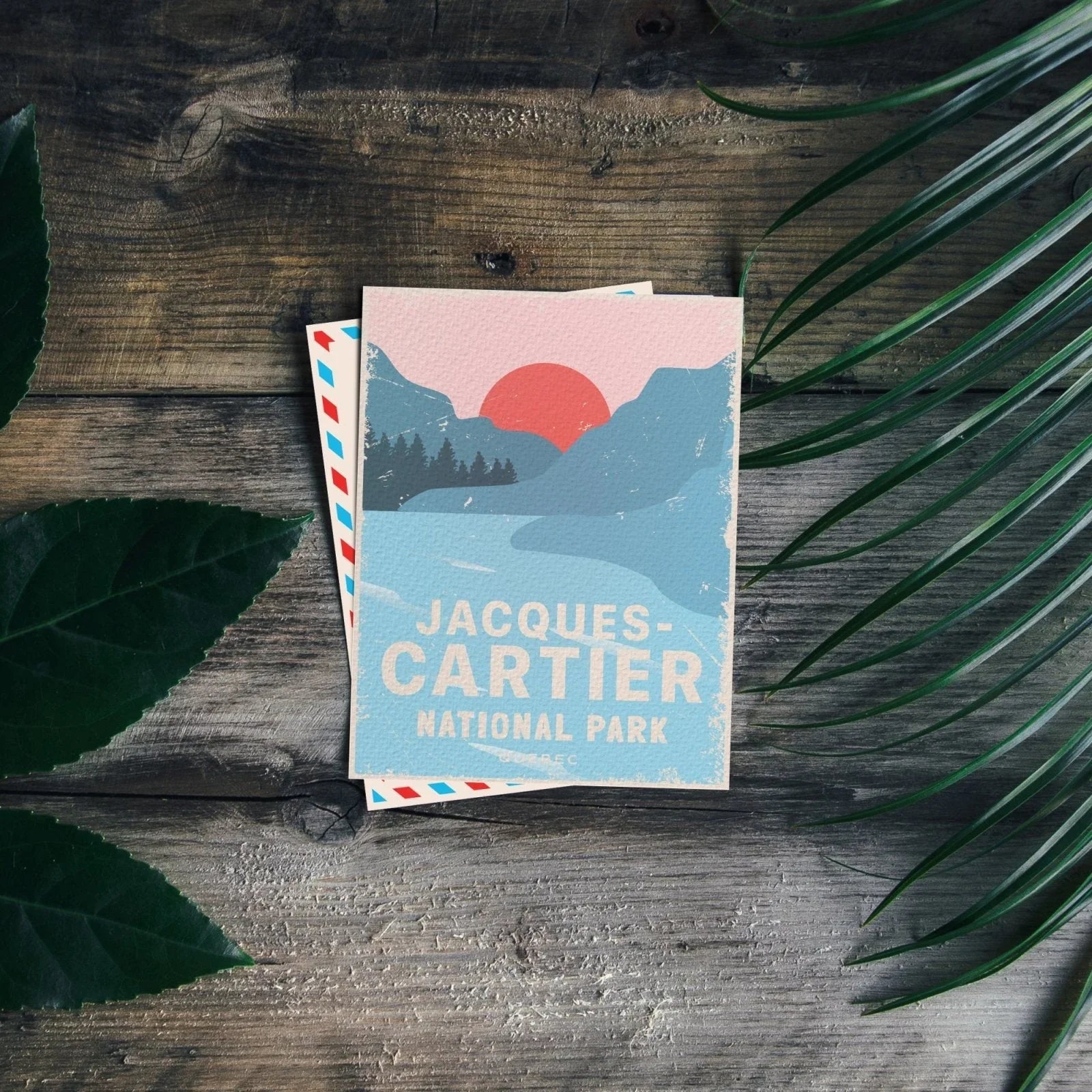Jacques Cartier National Park postcard with mountain illustration on rustic wooden table