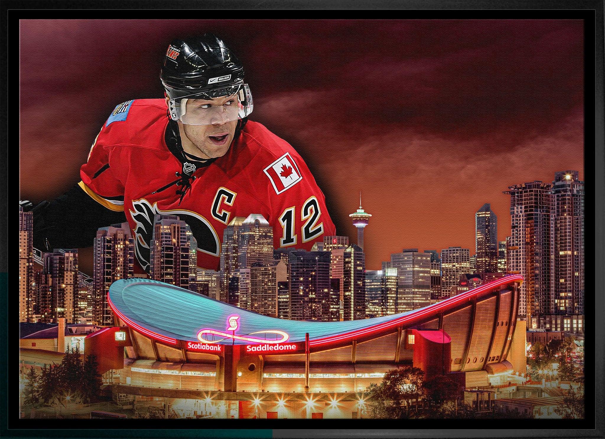 Hockey player in Calgary Flames jersey above Scotiabank Saddledome and Calgary skyline at dusk