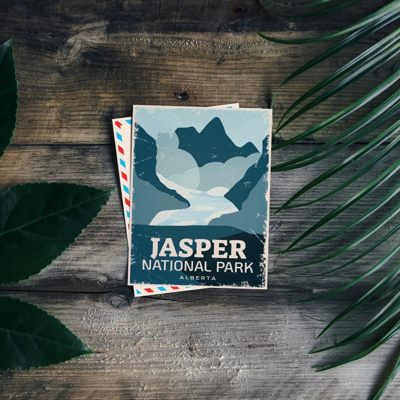 Jasper National Park postcard with illustrated mountains on rustic wood, Alberta, Canada