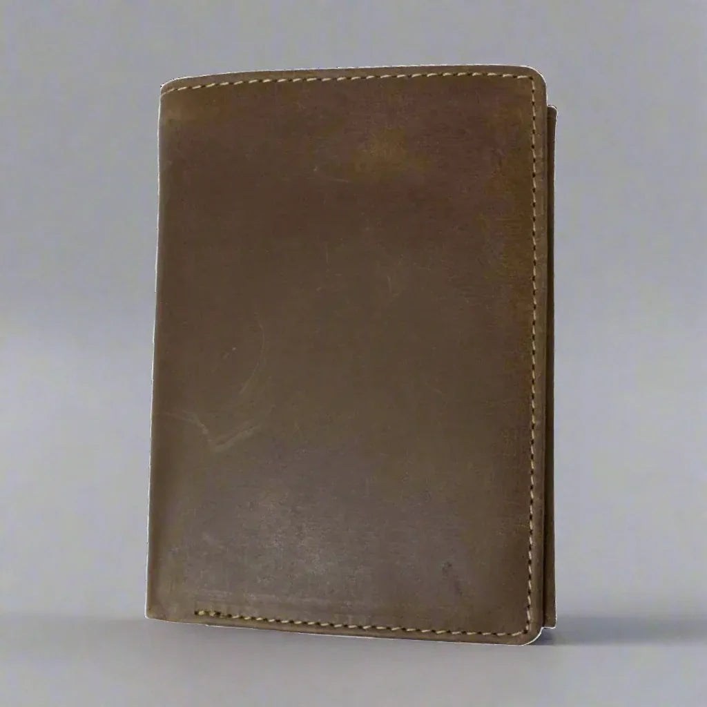 Brown leather wallet with visible stitching on plain background