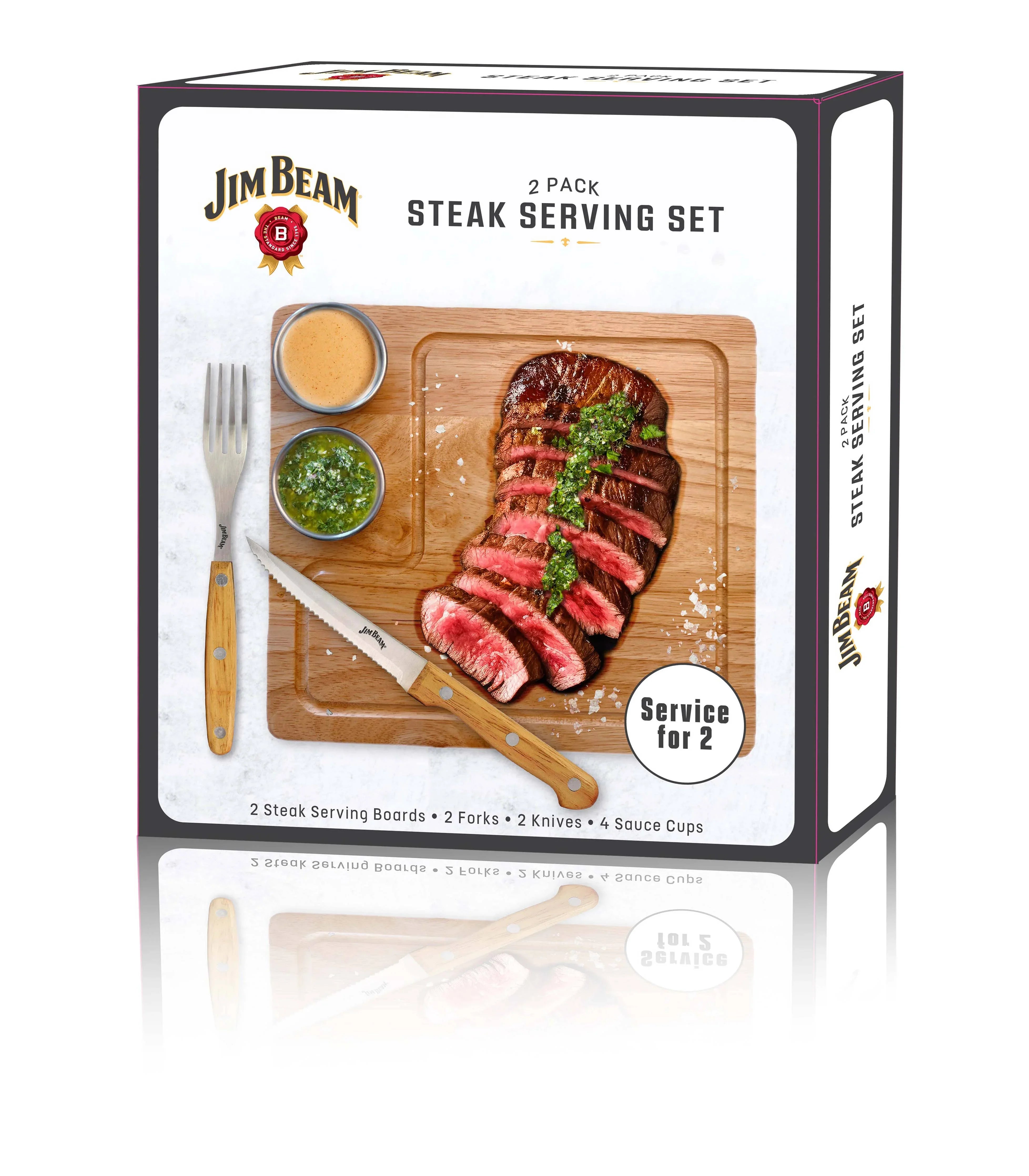 Jim Beam steak serving set box with steak, sauce cups, knife and fork on a cutting board