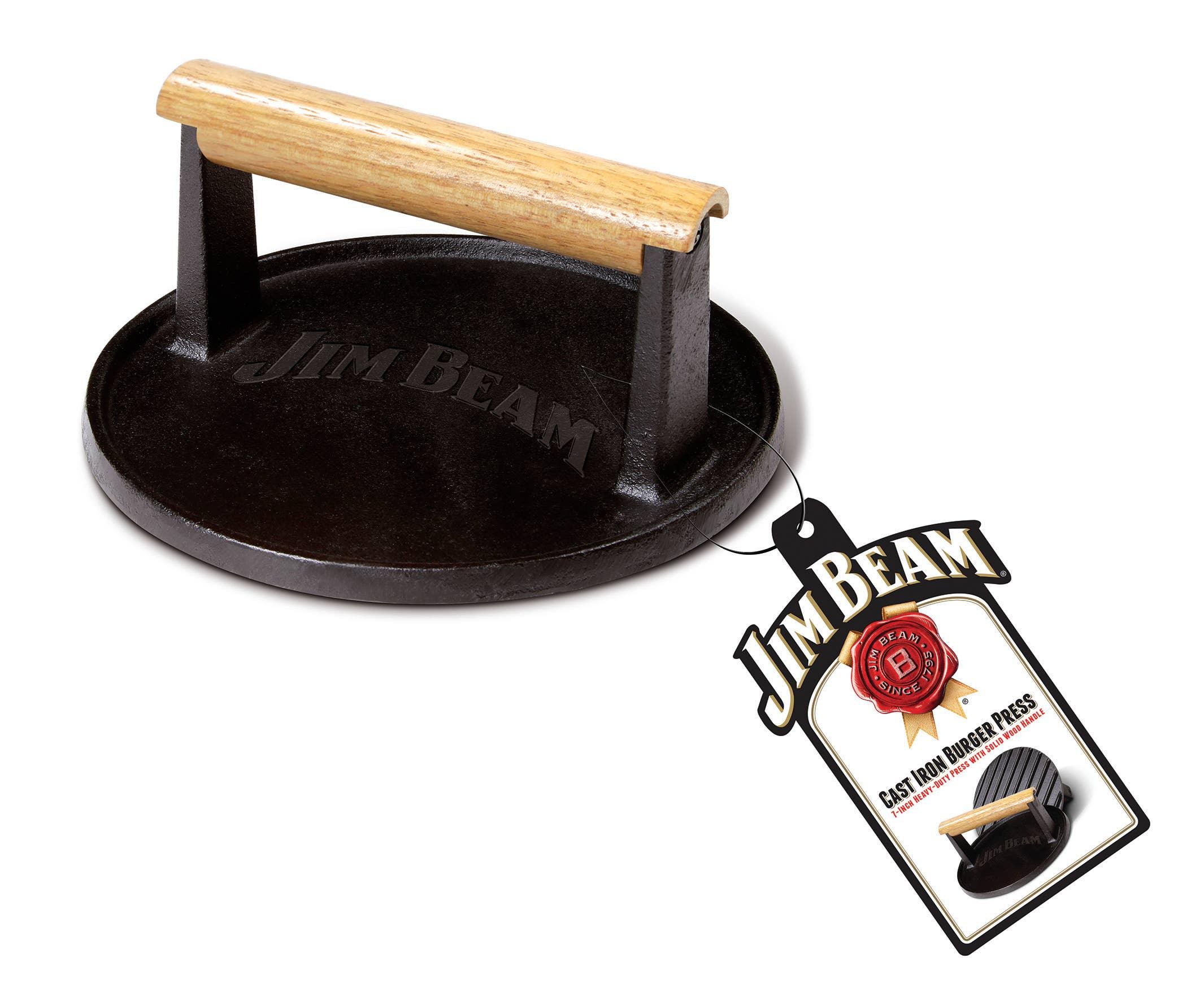 Jim Beam cast iron burger press with wooden handle and product tag on white background