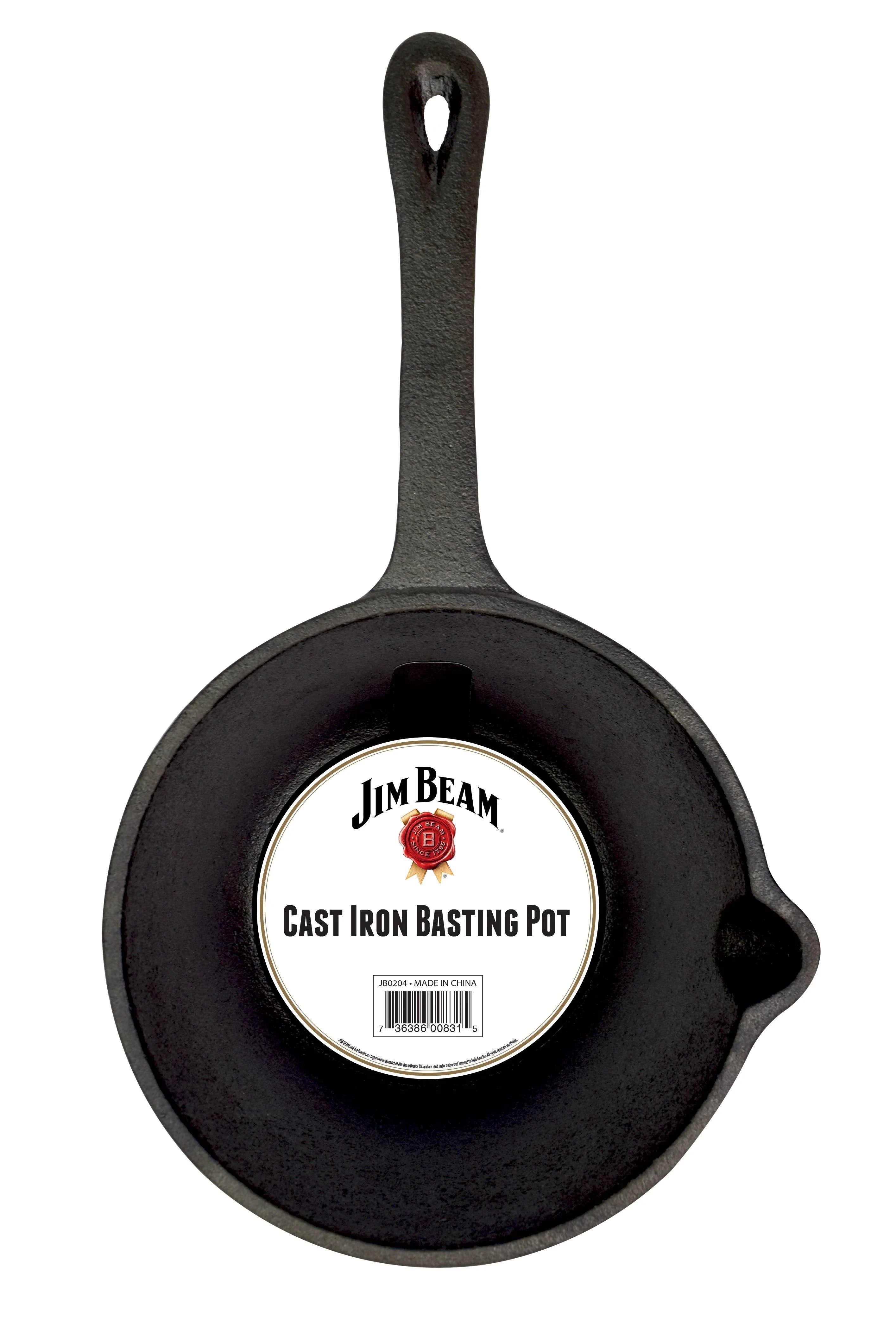 Jim Beam cast iron basting pot with long handle on white background