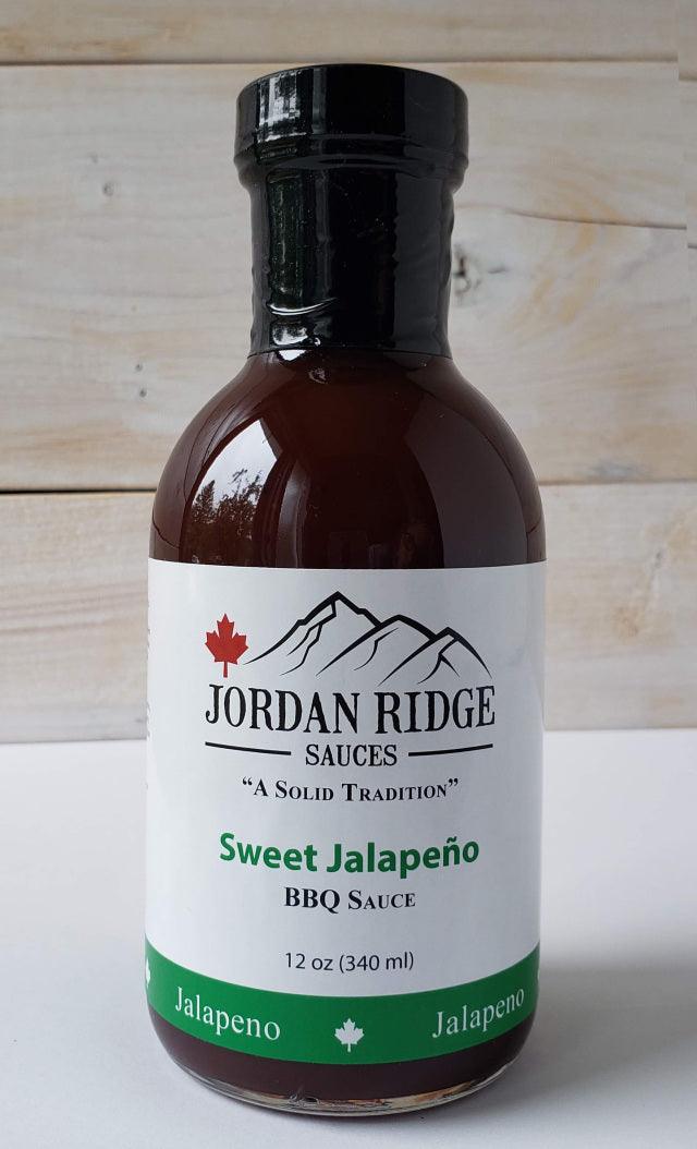 Jordan Ridge Sweet Jalapeño BBQ sauce bottle on light wood background