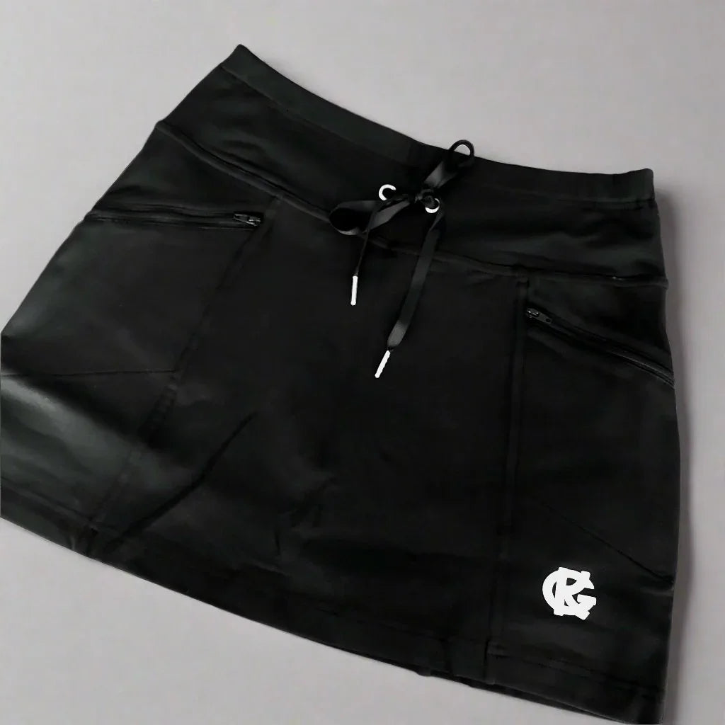 Black athletic skirt with drawstring waist, zippered pockets, and white embroidered logo