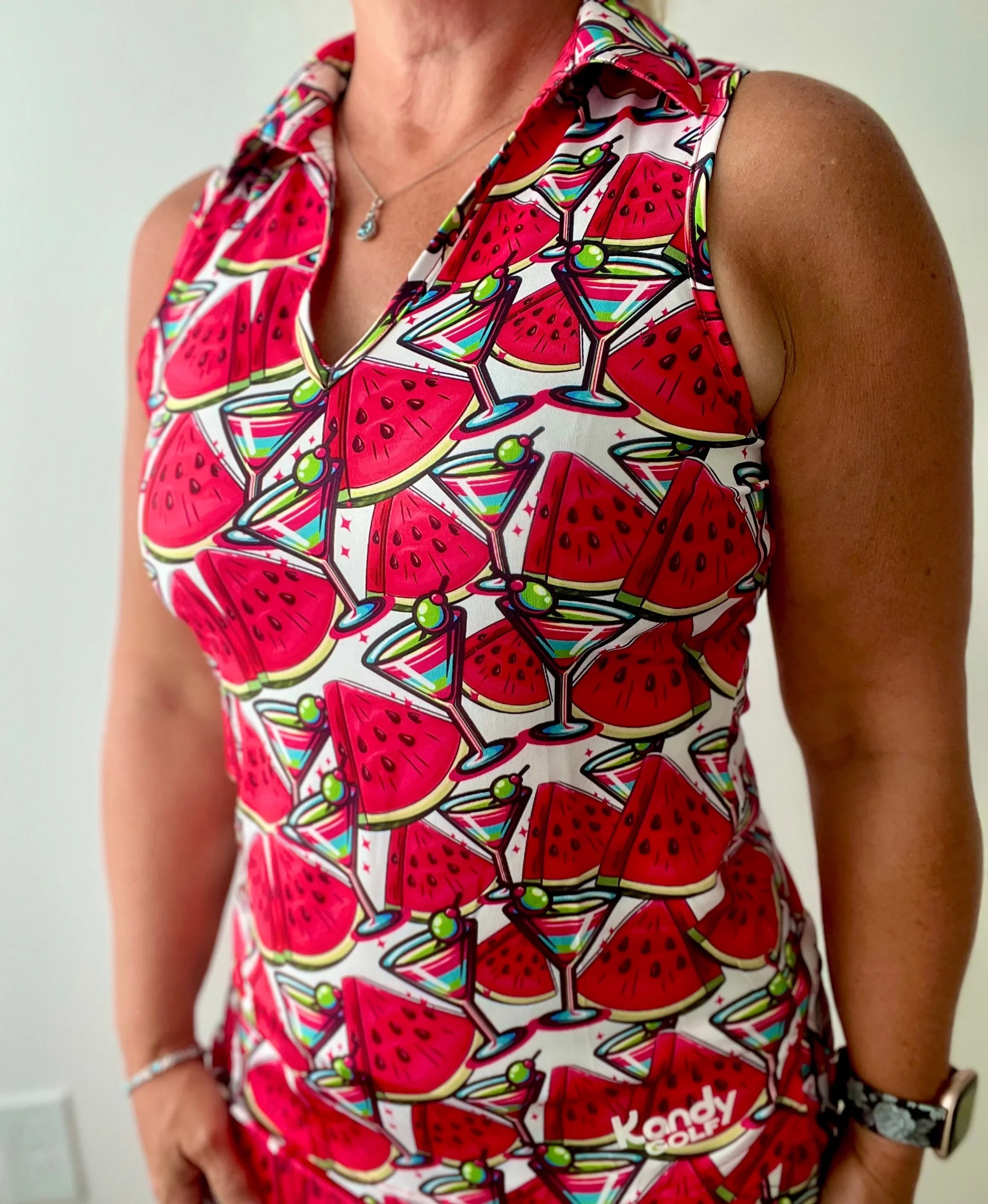 Sleeveless women's golf polo shirt with watermelon and martini glass print by Kandy Golf