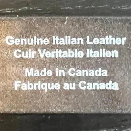 Genuine Italian leather label embossed on brown belt, made in Canada, bilingual English French text