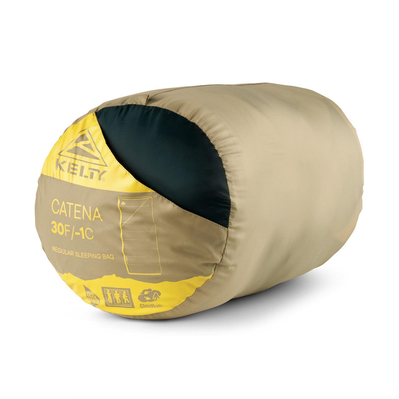 Kelty Catena 30F regular sleeping bag packed in tan and yellow stuff sack