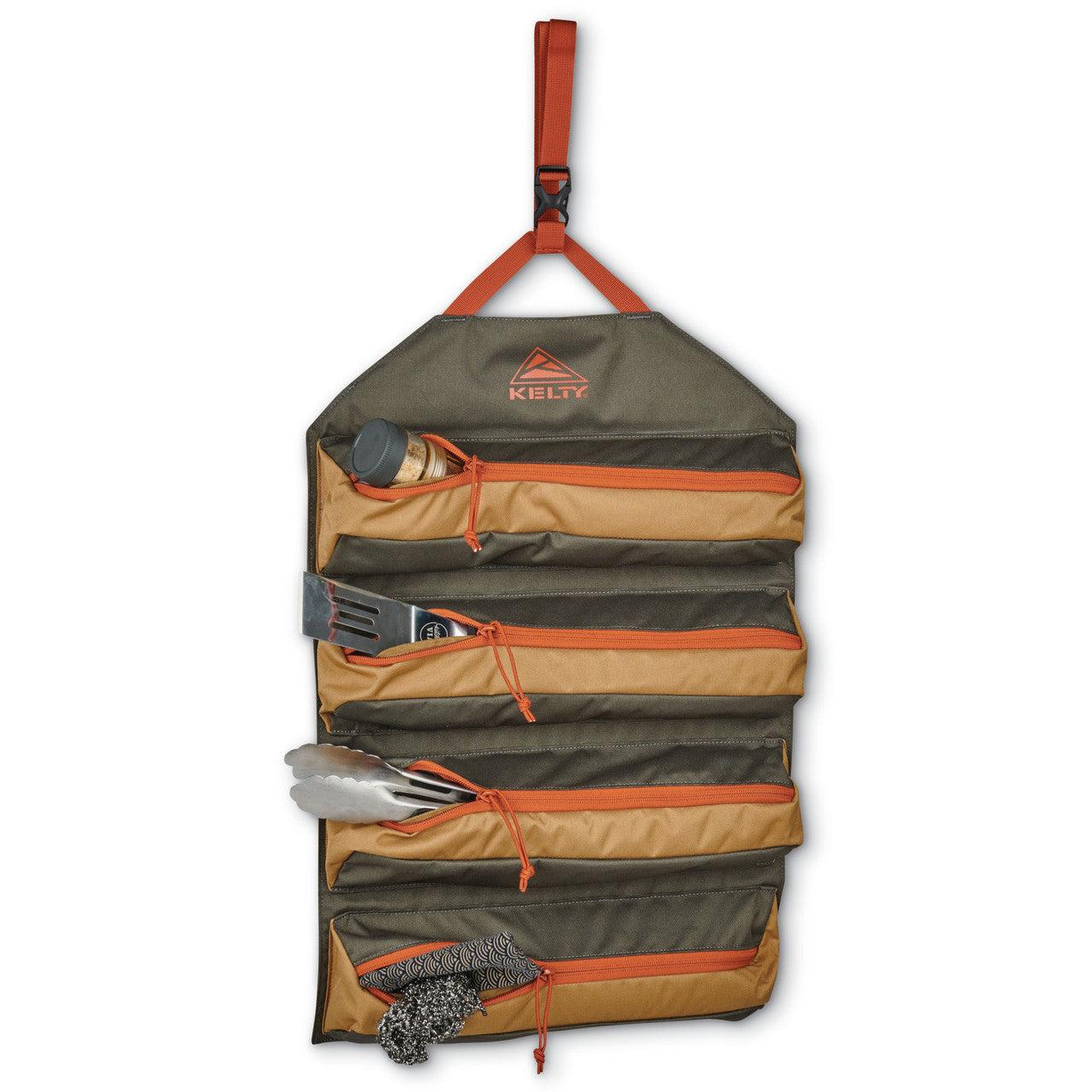 Roll-up chef utensil organizer with pockets, hanging strap, and camping tools