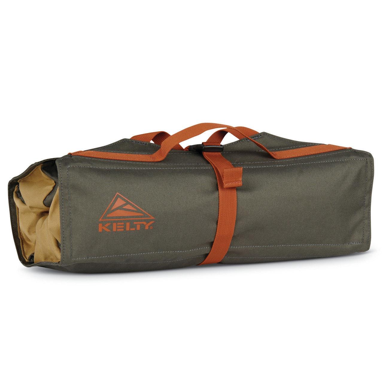 Kelty chef roll bag in dull gold and green with orange handles, camping gear storage.