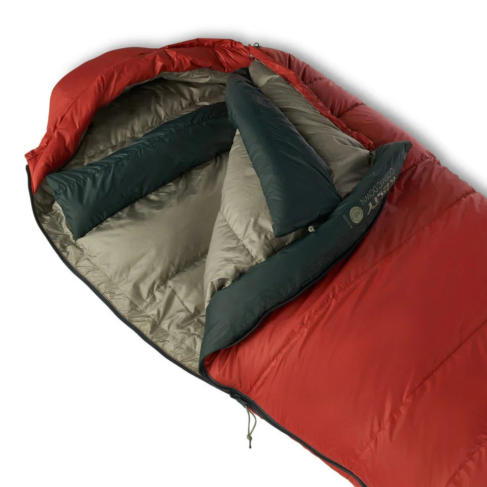 Red and gray Kelty down sleeping bag with visible inner insulation and draft collar