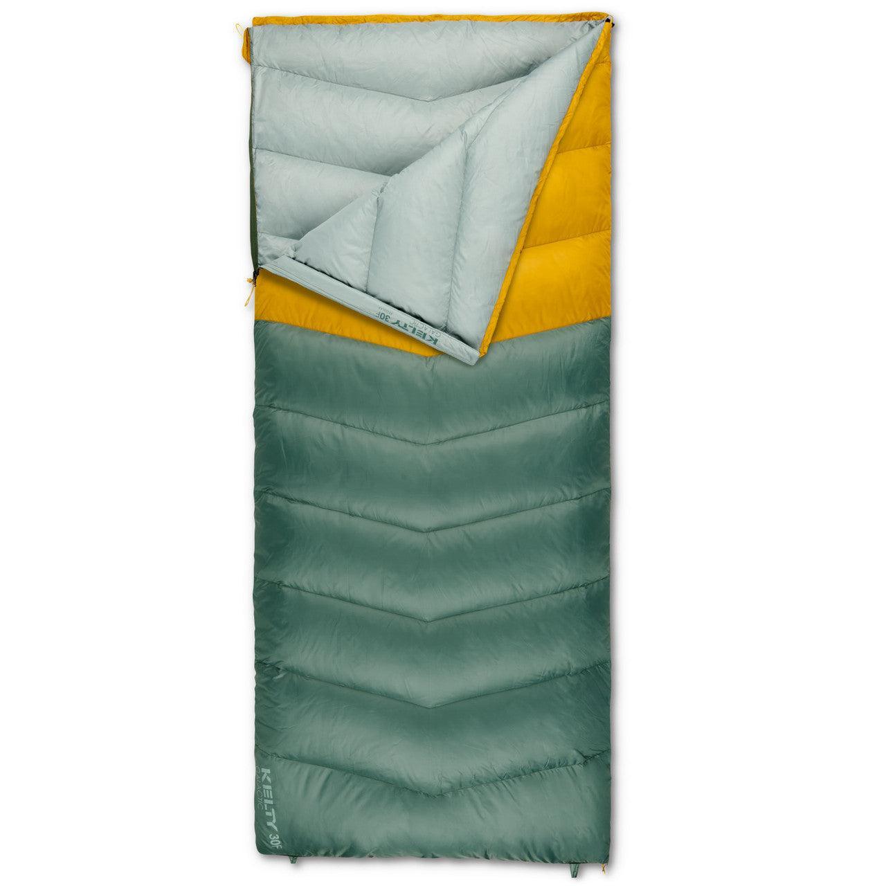 Green and yellow rectangular sleeping bag with quilted pattern on a white background