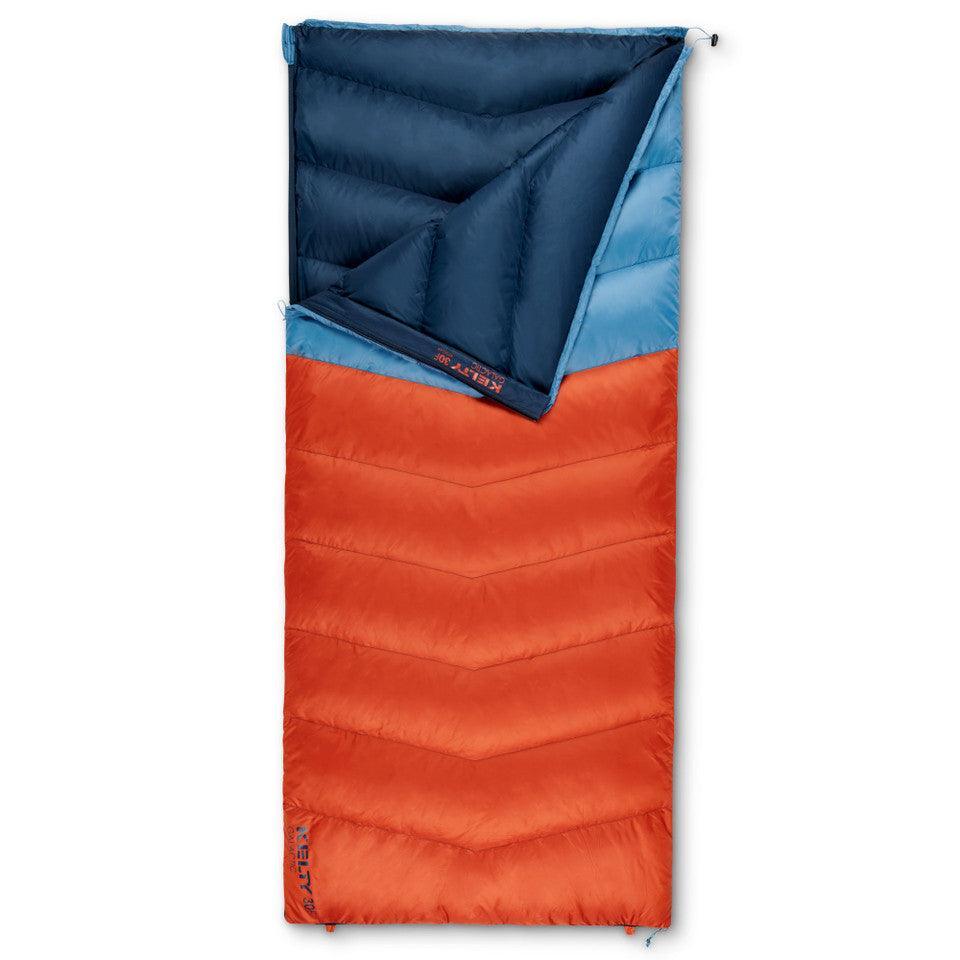 Rectangular orange and blue sleeping bag, insulated for camping and outdoor use