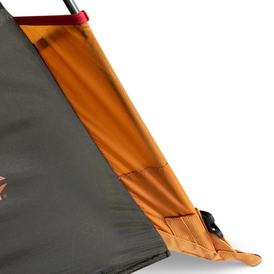 Close-up of Kelty Grand Mesa 2 backpacking tent orange corner and fabric detail