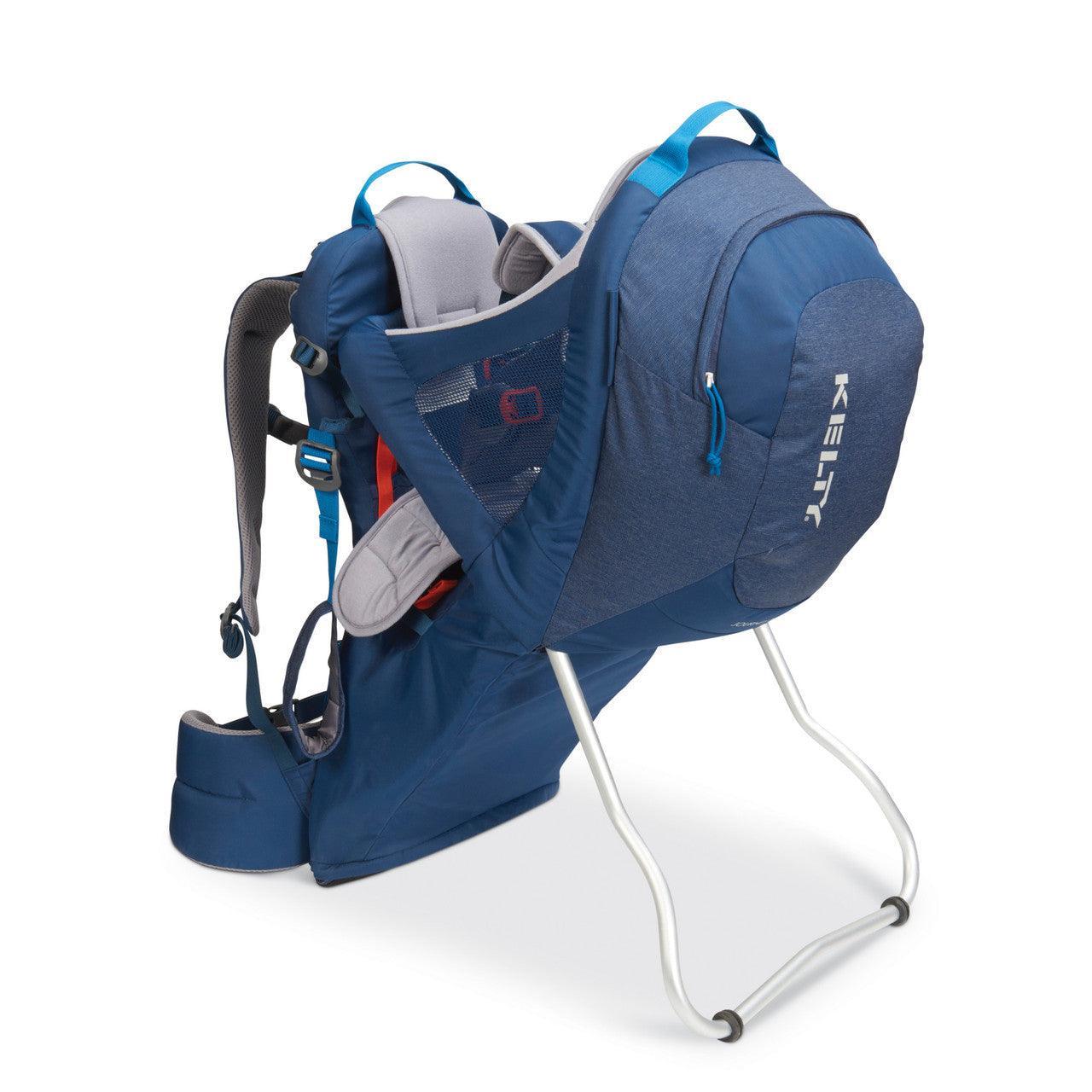 Kelty blue child carrier backpack with aluminum frame and padded straps on white background