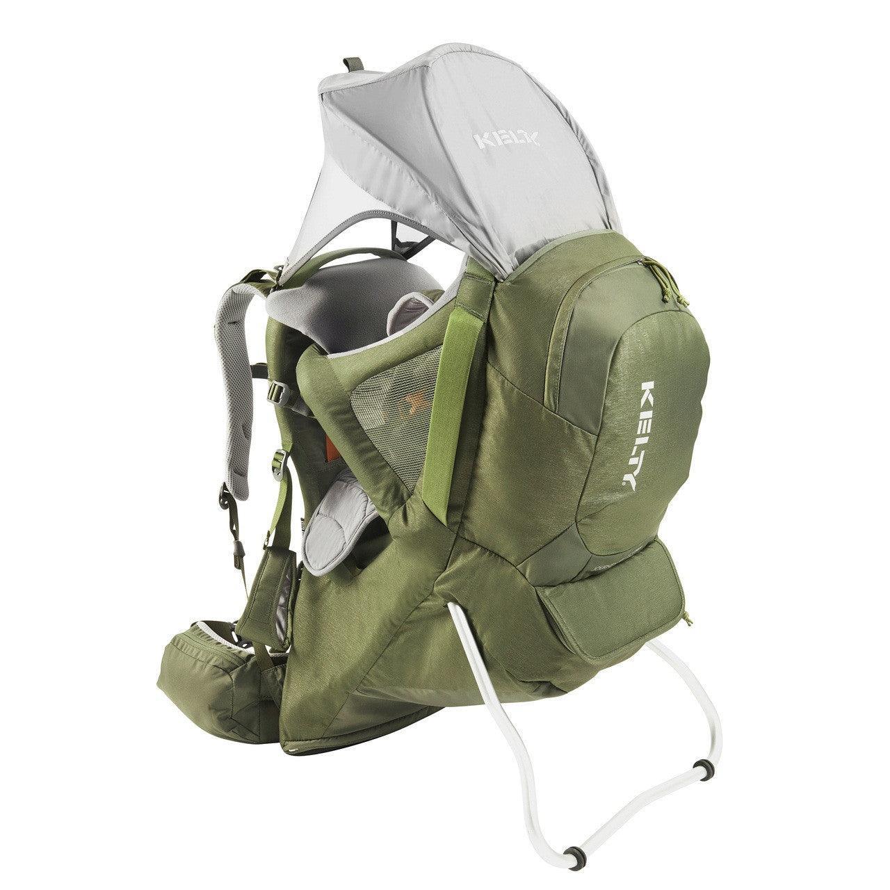 Green Kelty child carrier backpack with sunshade and sturdy kickstand