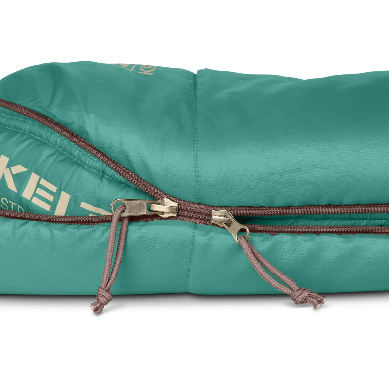 Green sleeping bag with brown zipper and Kelty logo close-up
