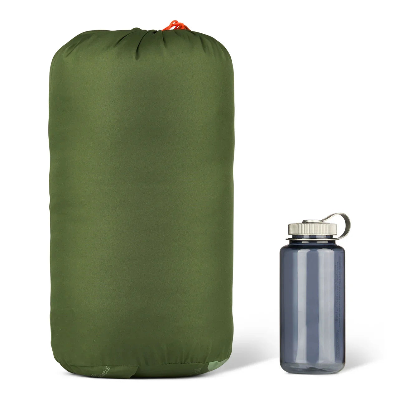 Olive green sleeping bag in stuff sack next to grey water bottle on white background