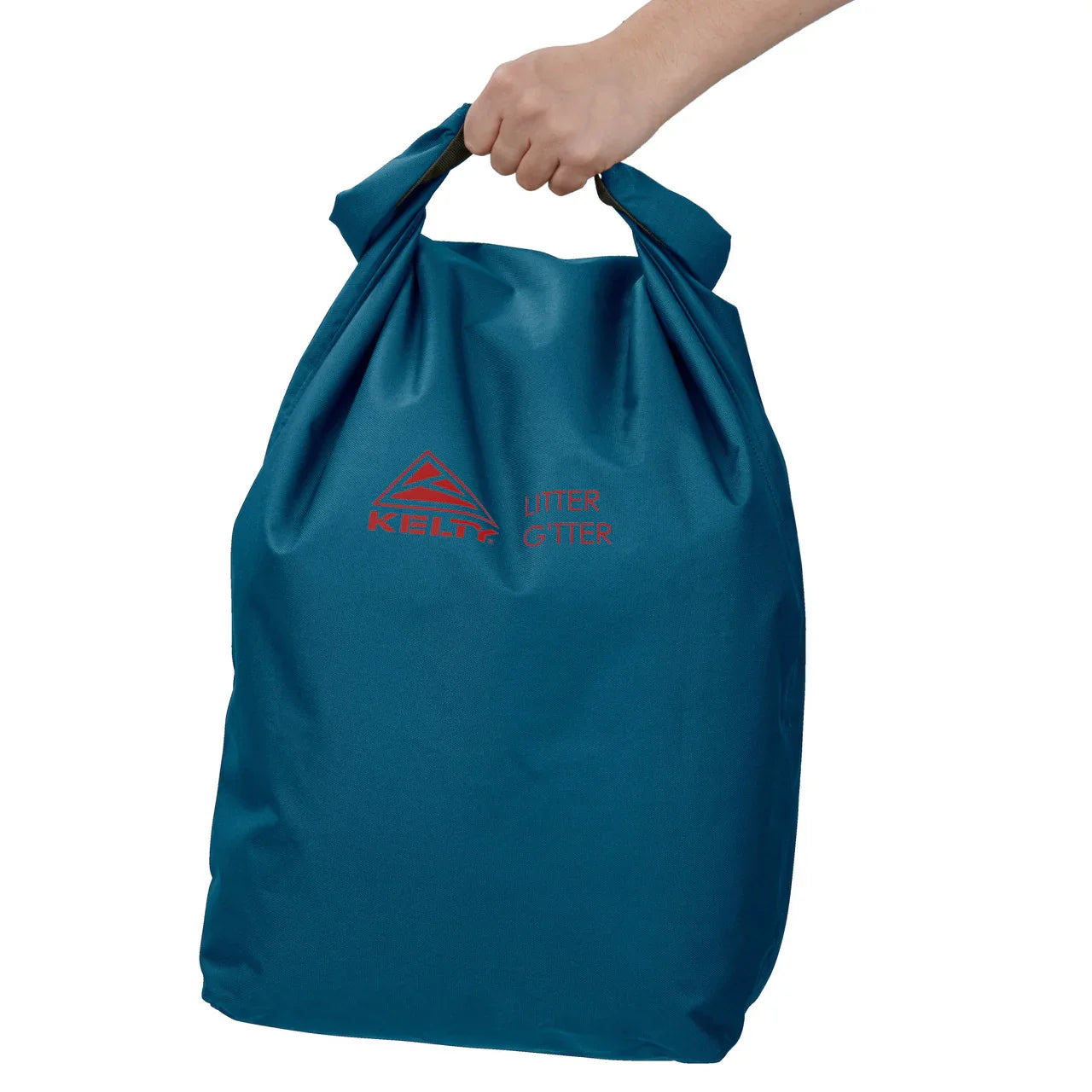 Hand holding a blue Kelty Litter Gitter reusable waste bag with red logo