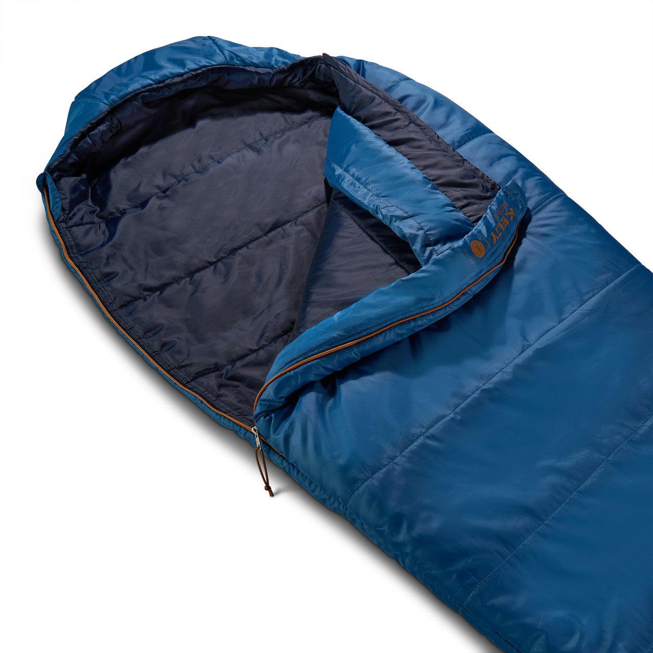 Blue mummy-style sleeping bag for camping with insulated interior and hood