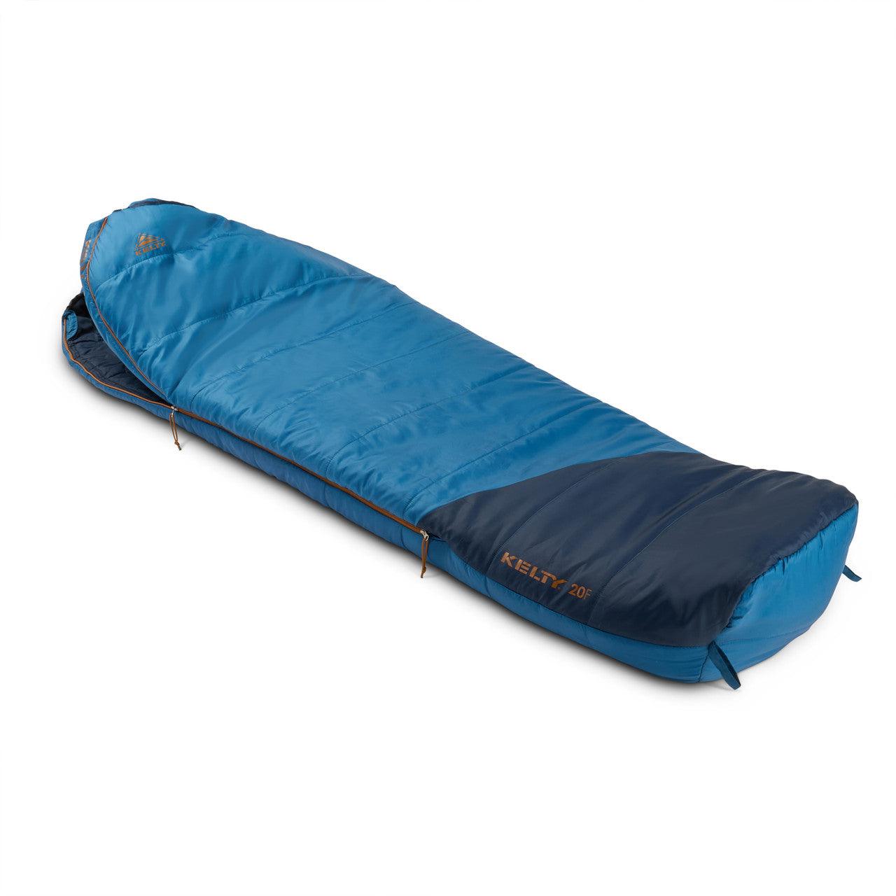 Blue Kelty 20F sleeping bag for camping on white background