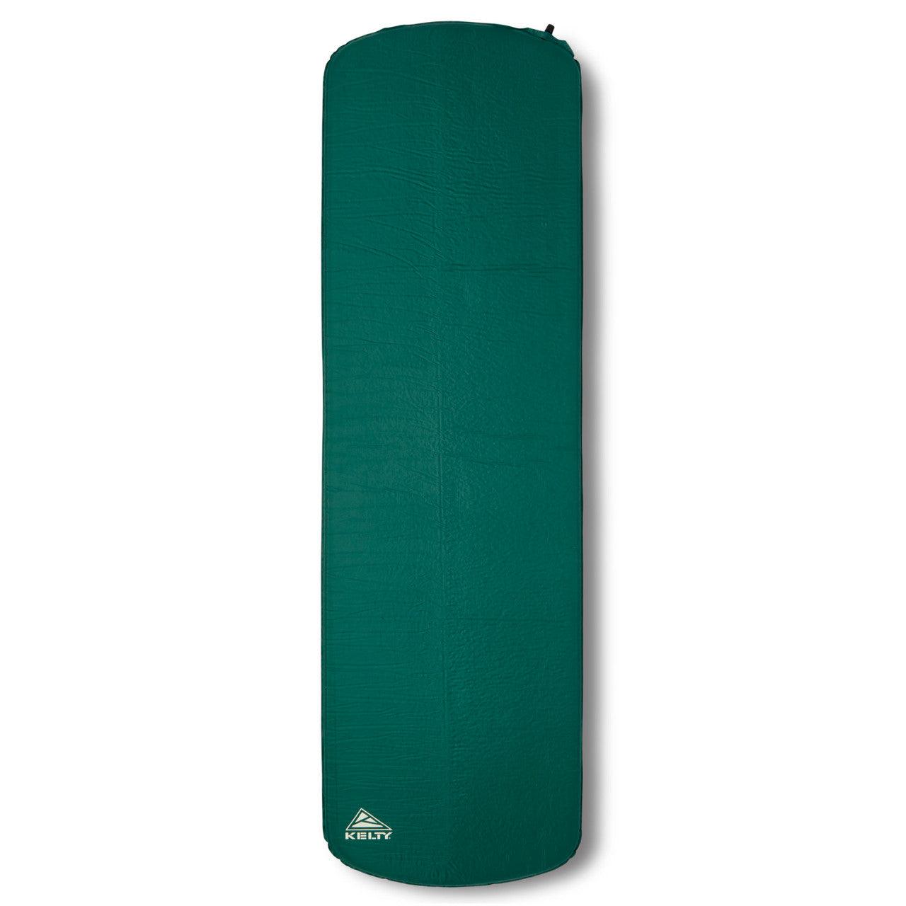 Green rectangular camping sleeping pad with rounded edge and Kelty logo on white background