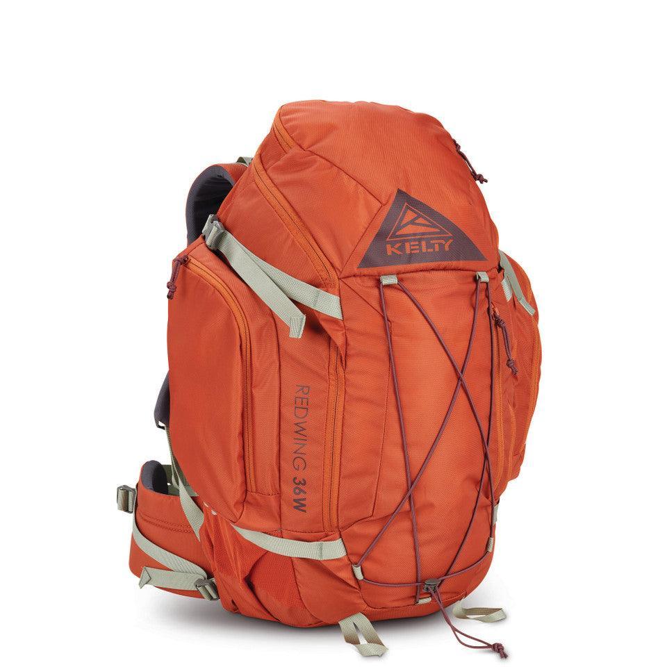 Kelty Redwing 36W women's orange hiking backpack with multiple pockets and straps