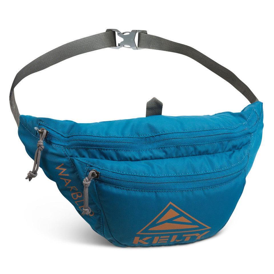 Blue Kelty Warbler fanny pack with zippered pockets and adjustable strap, isolated on white