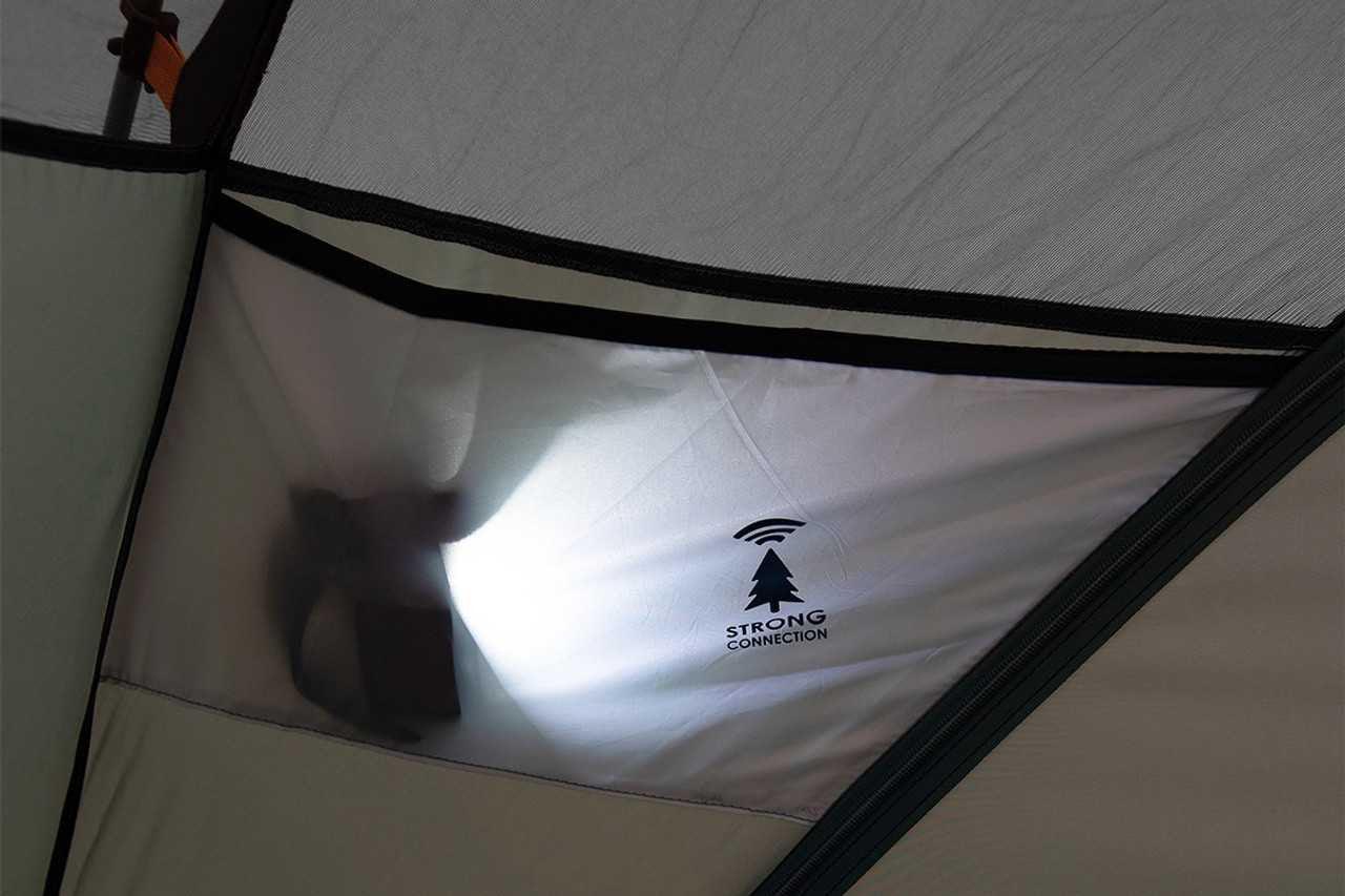 Kelty Wireless 2 tent interior mesh pocket with flashlight and 'strong connection' tree logo
