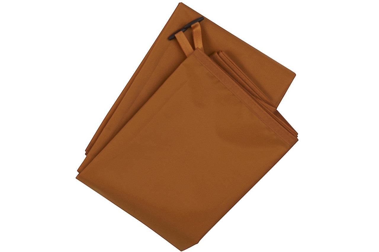 Brown rectangular tent footprint for camping, folded and laid flat on white background