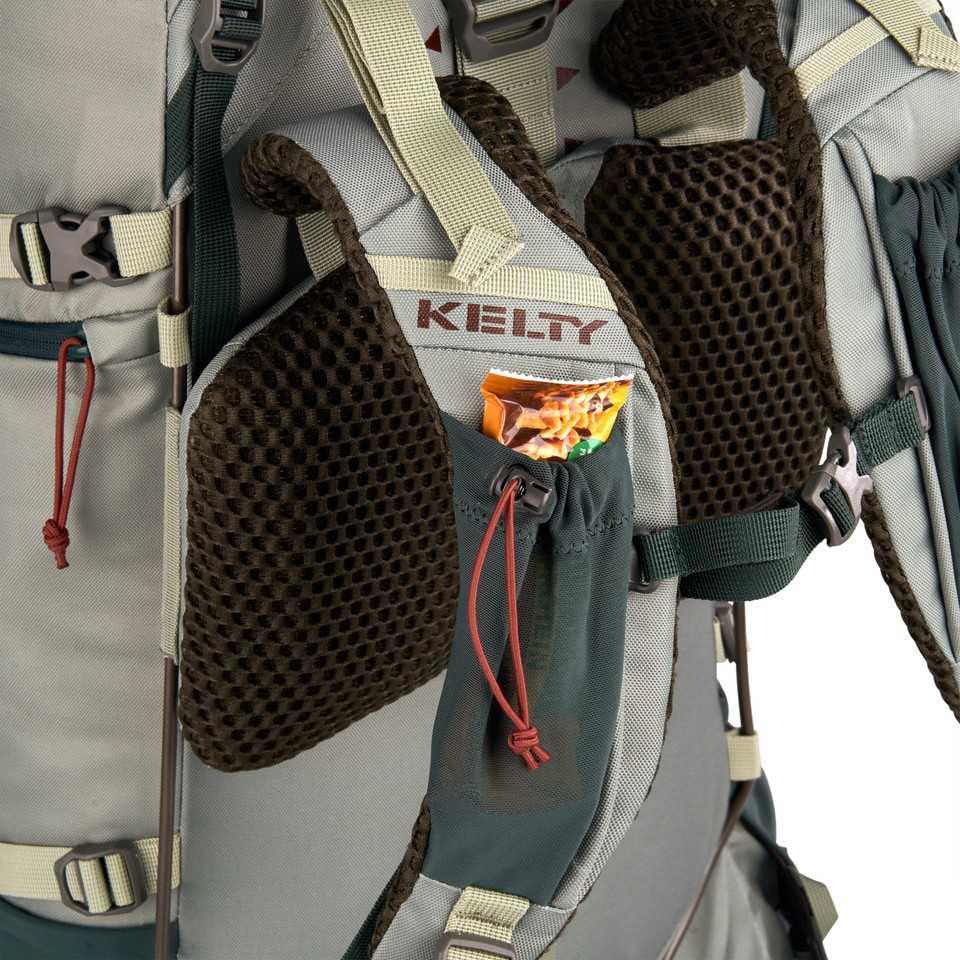 Kelty Women's Glendale 65L backpack hip belt pocket with snack bar, close-up view