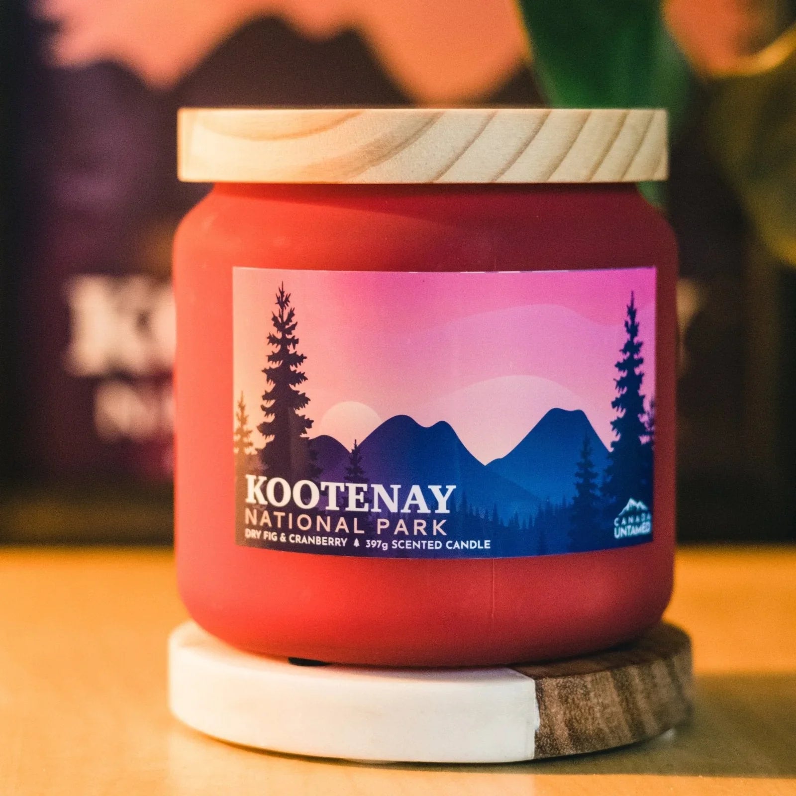 Kootenay National Park dry fig cranberry scented candle in red jar with wooden lid