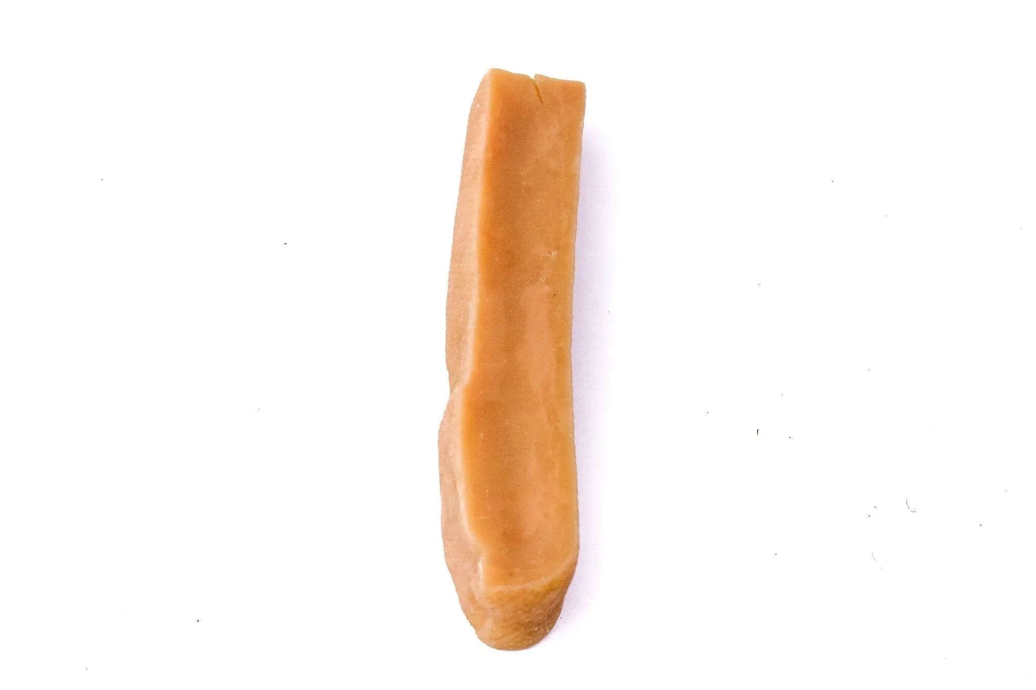 Large Yak Snak dog chew on white background, natural hard cheese dog treat