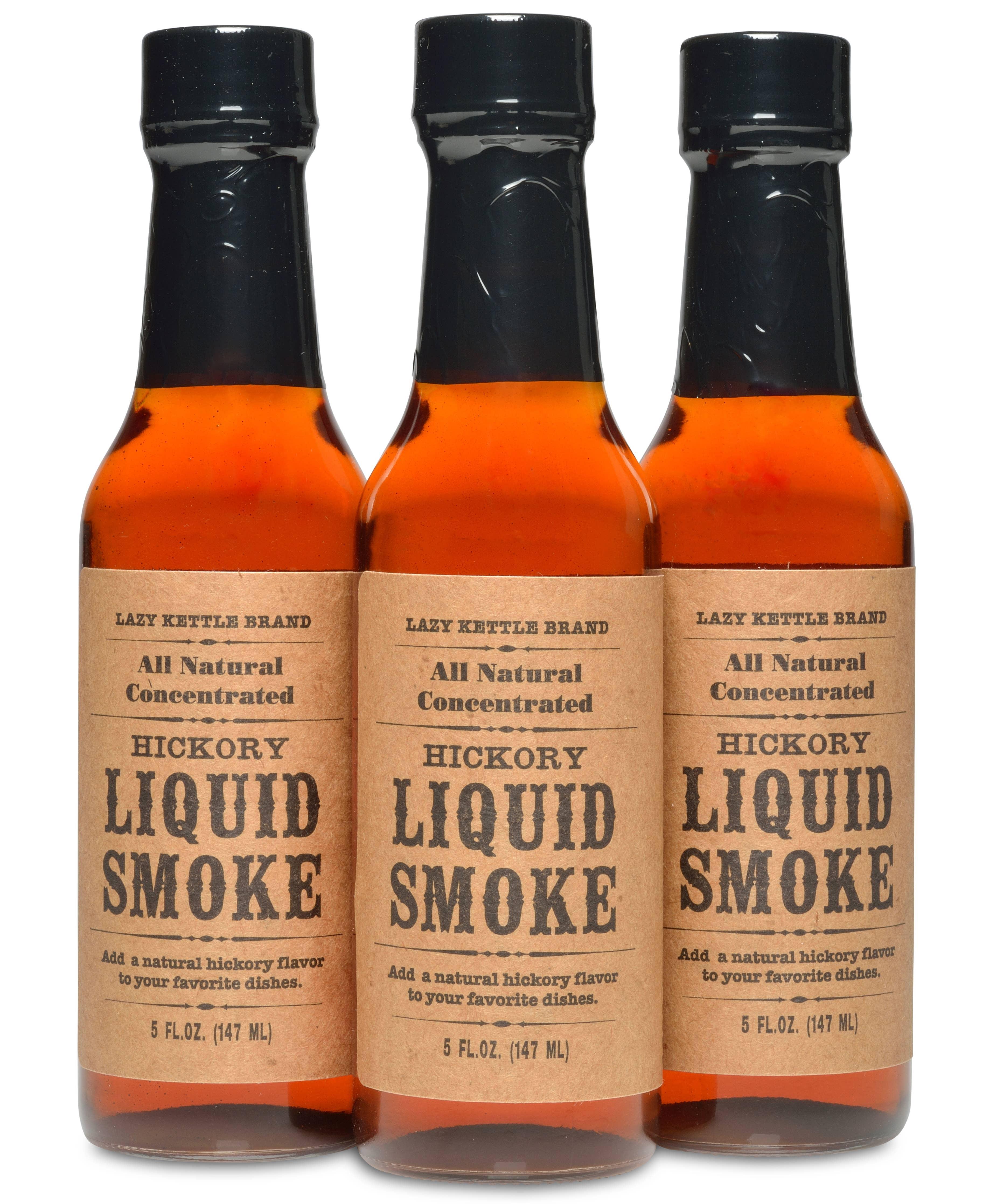 Three bottles of Lazy Kettle Brand hickory liquid smoke all natural concentrated, 5 fl oz each