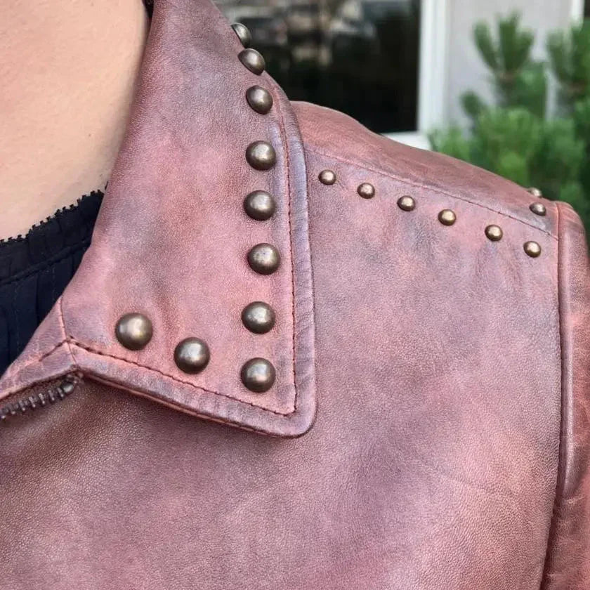 Pink leather western jacket for women with metal studs on the collar and shoulder