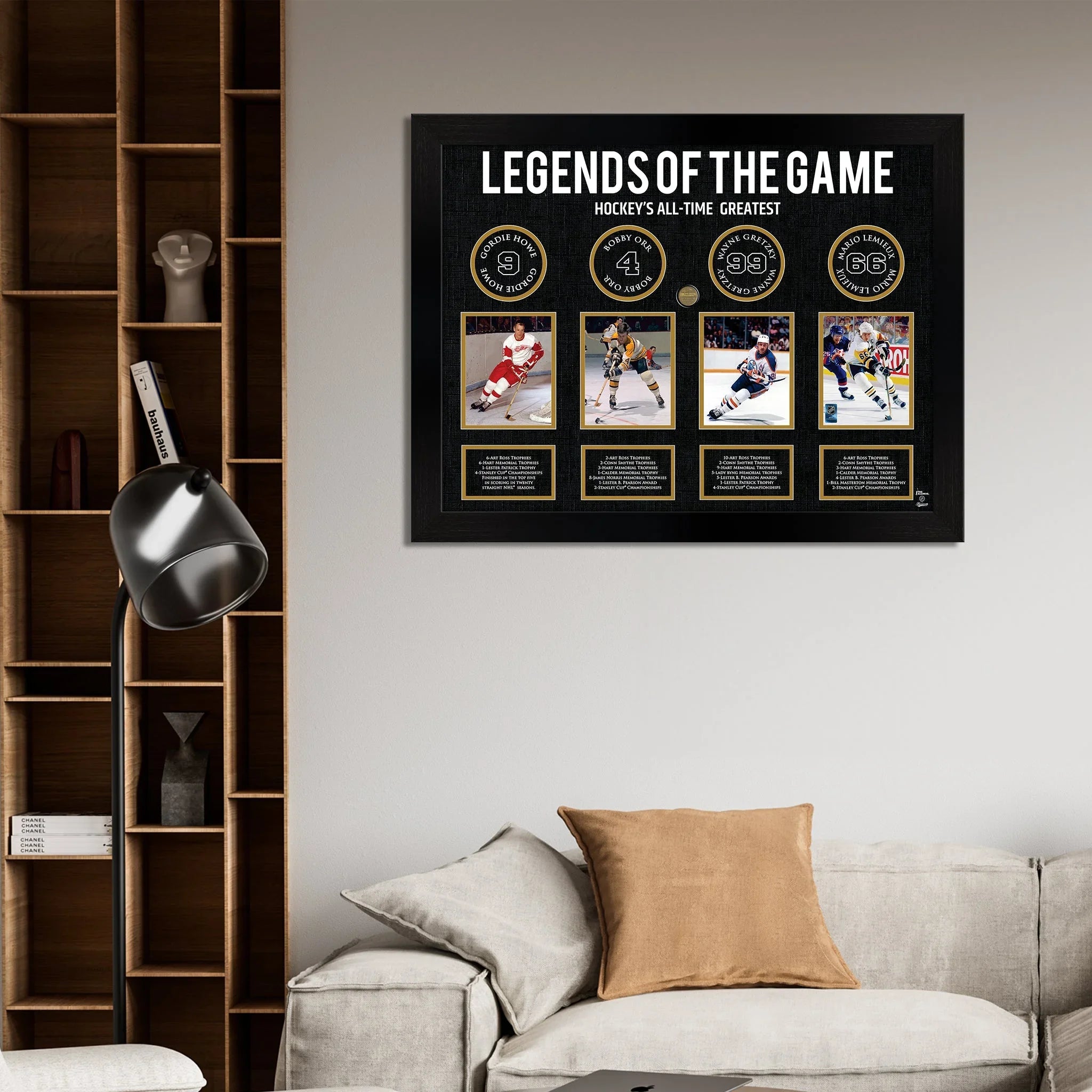 Hockey legends framed wall art above beige sofa in modern living room