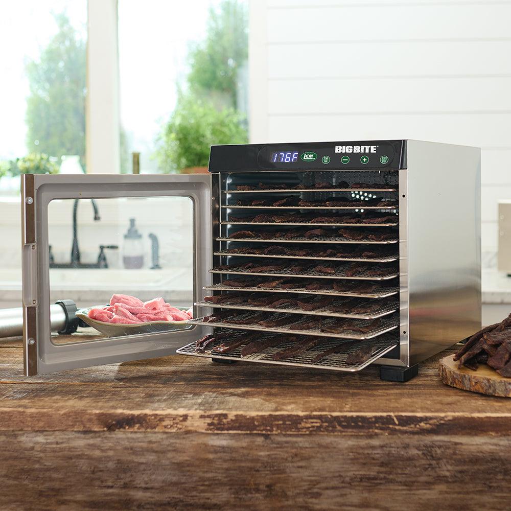 Big Bite 10-tray stainless steel food dehydrator with open door on a kitchen counter