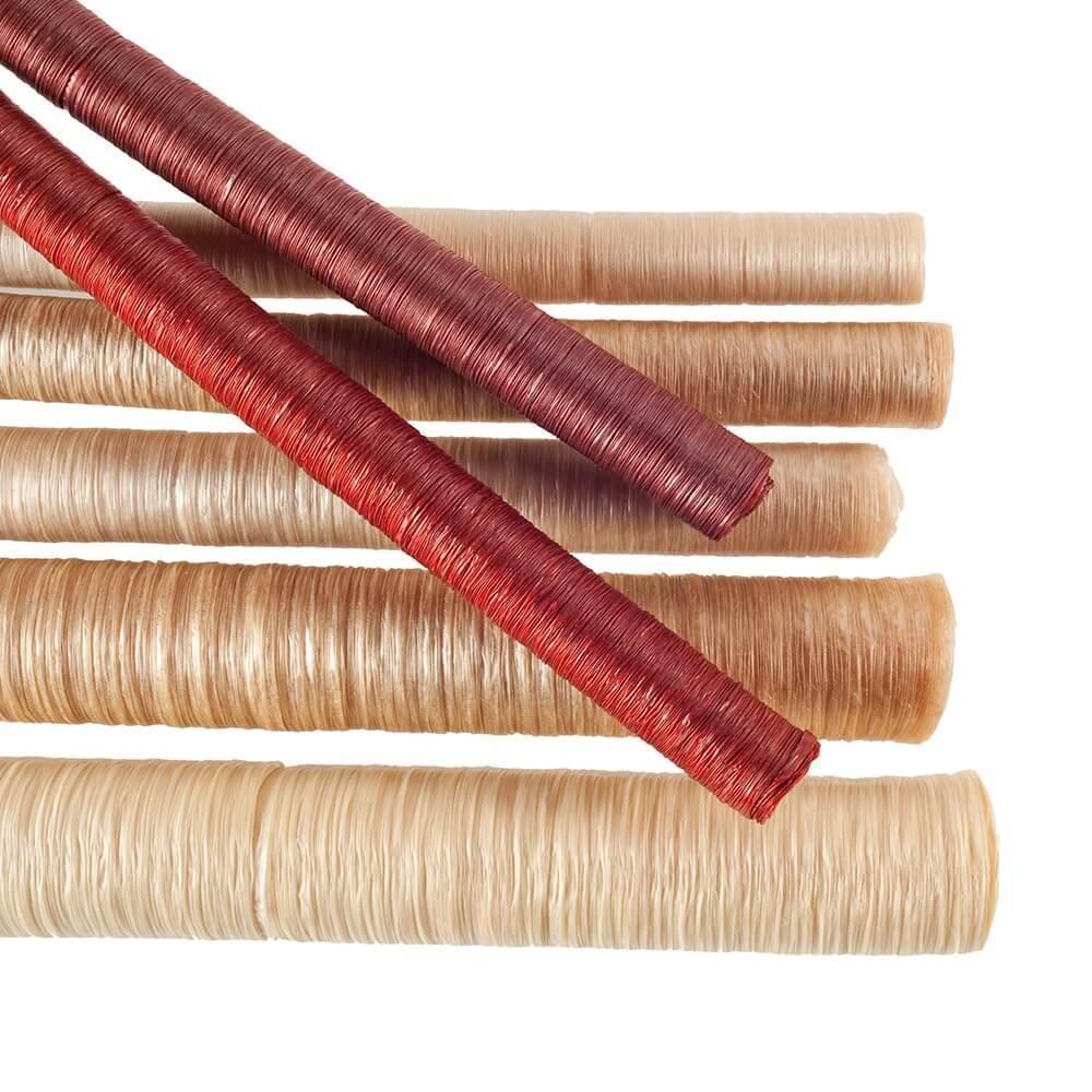 Collagen sausage casings in natural and red colors arranged on a white background