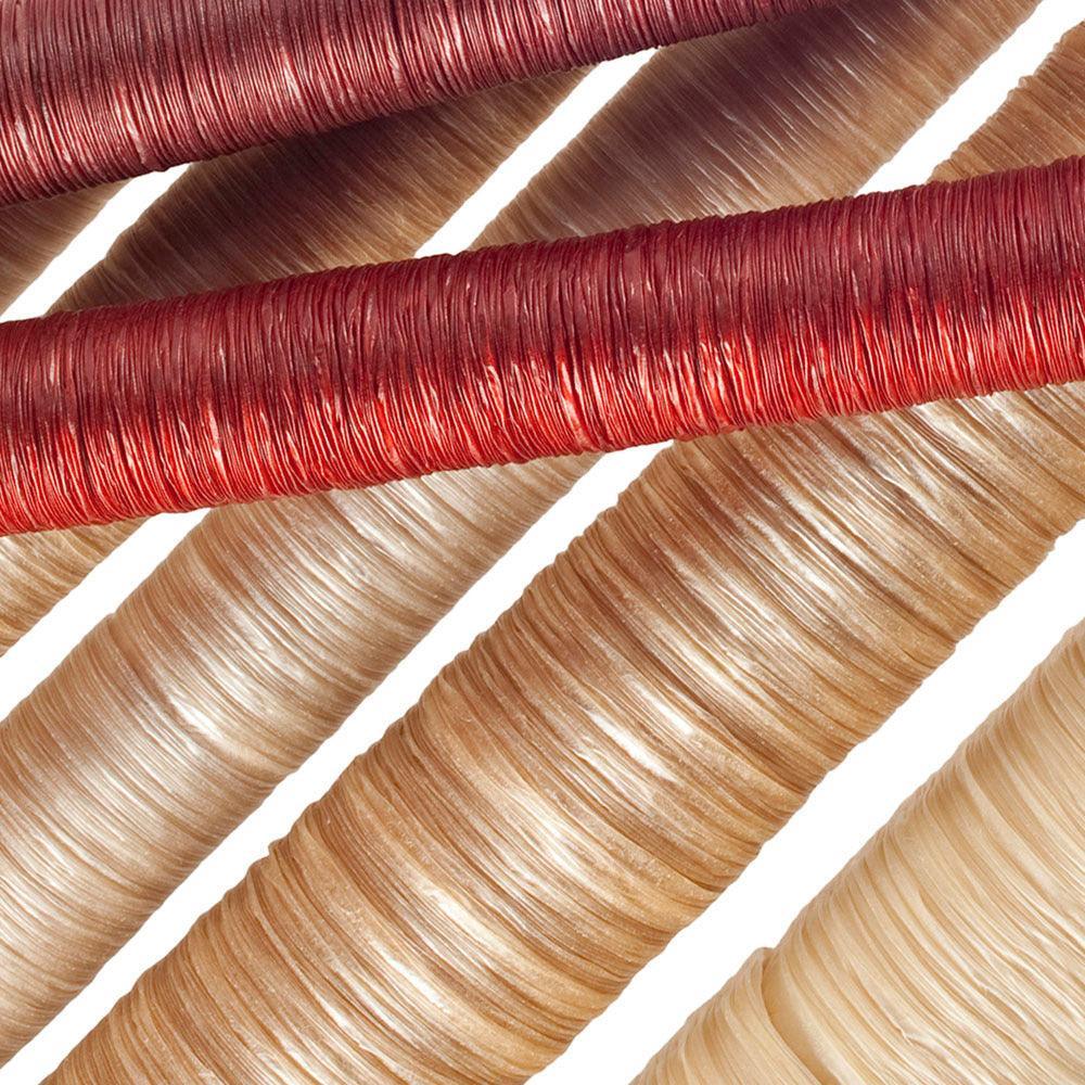 Close-up of assorted edible collagen sausage casings in beige and reddish colors