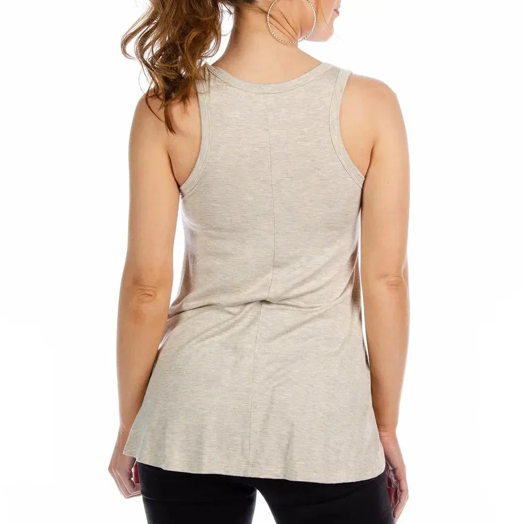 Back view of woman wearing a light gray tank top and black pants on white background