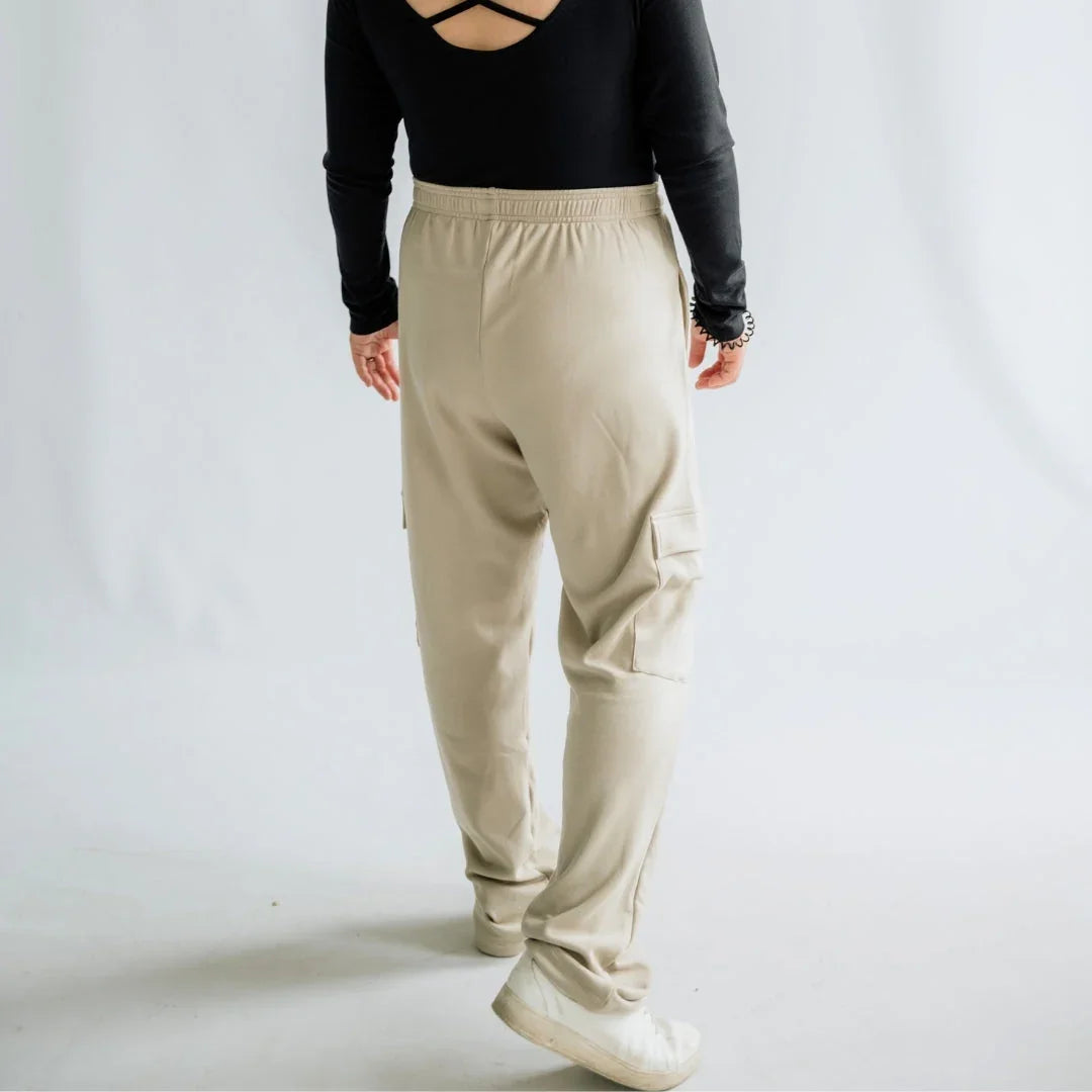 Back view of person wearing beige cargo jogger pants and black long sleeve top